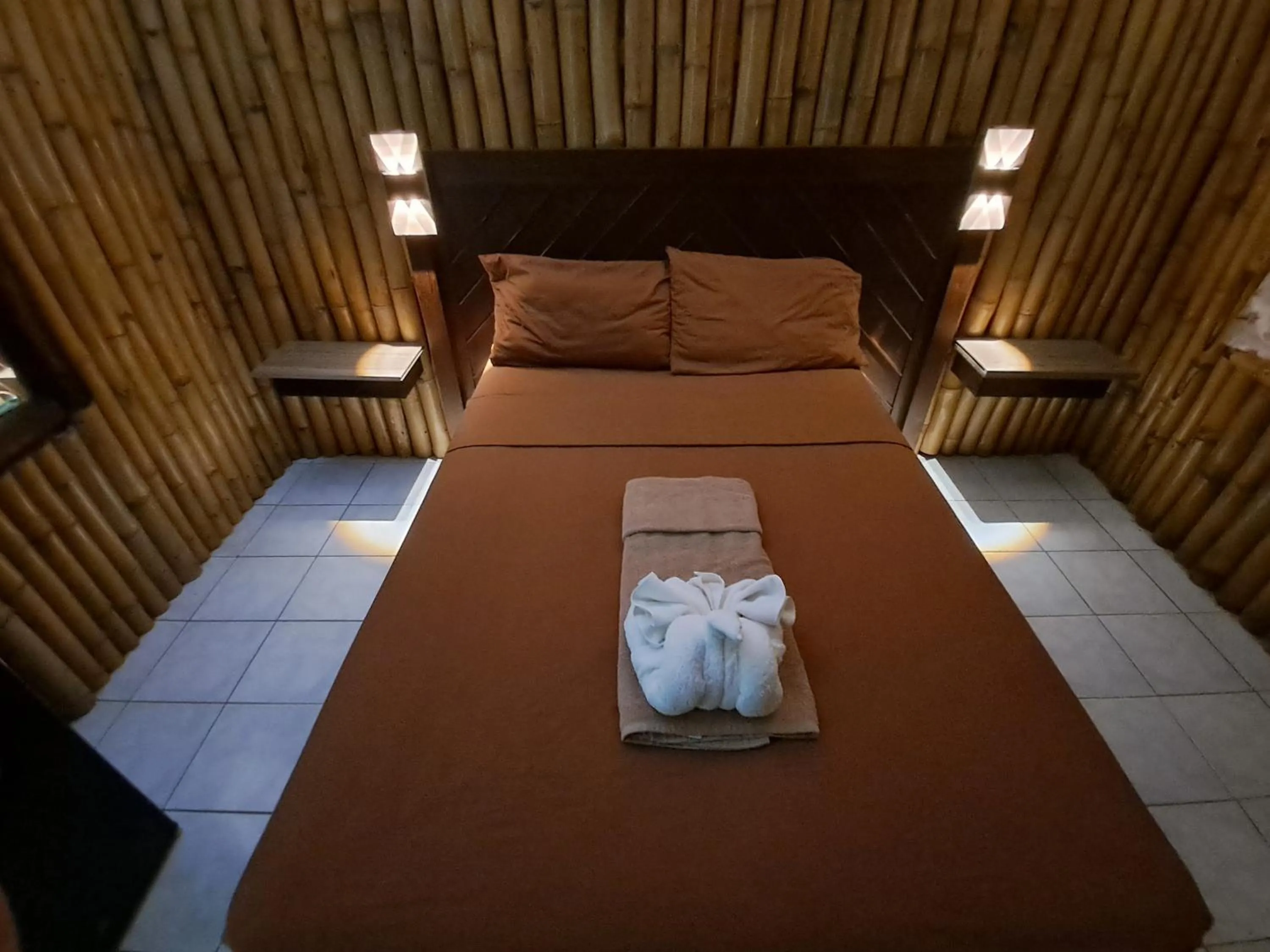 Bed in Barry's Rooms Negril
