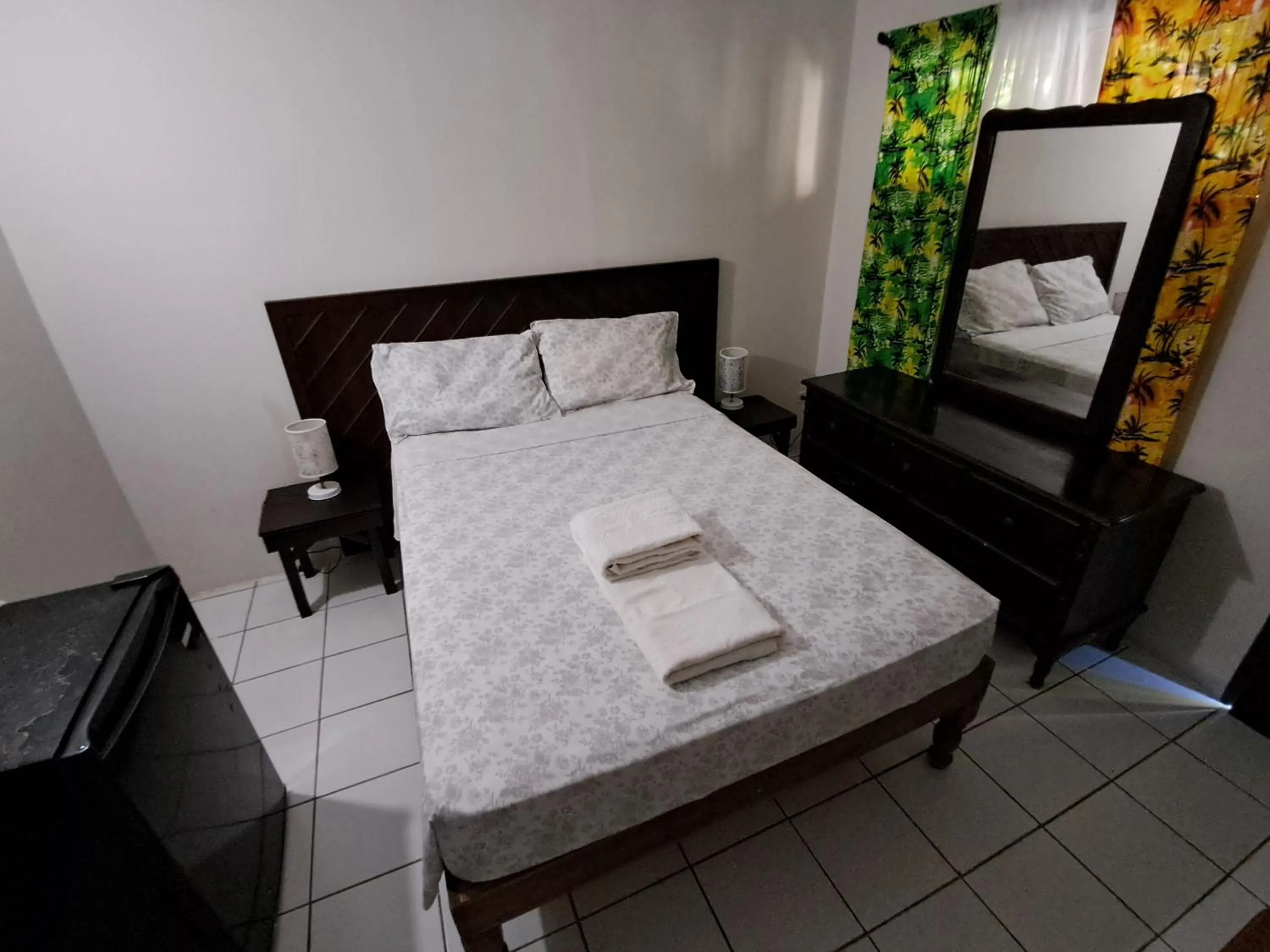 Bed in Barry's Rooms Negril