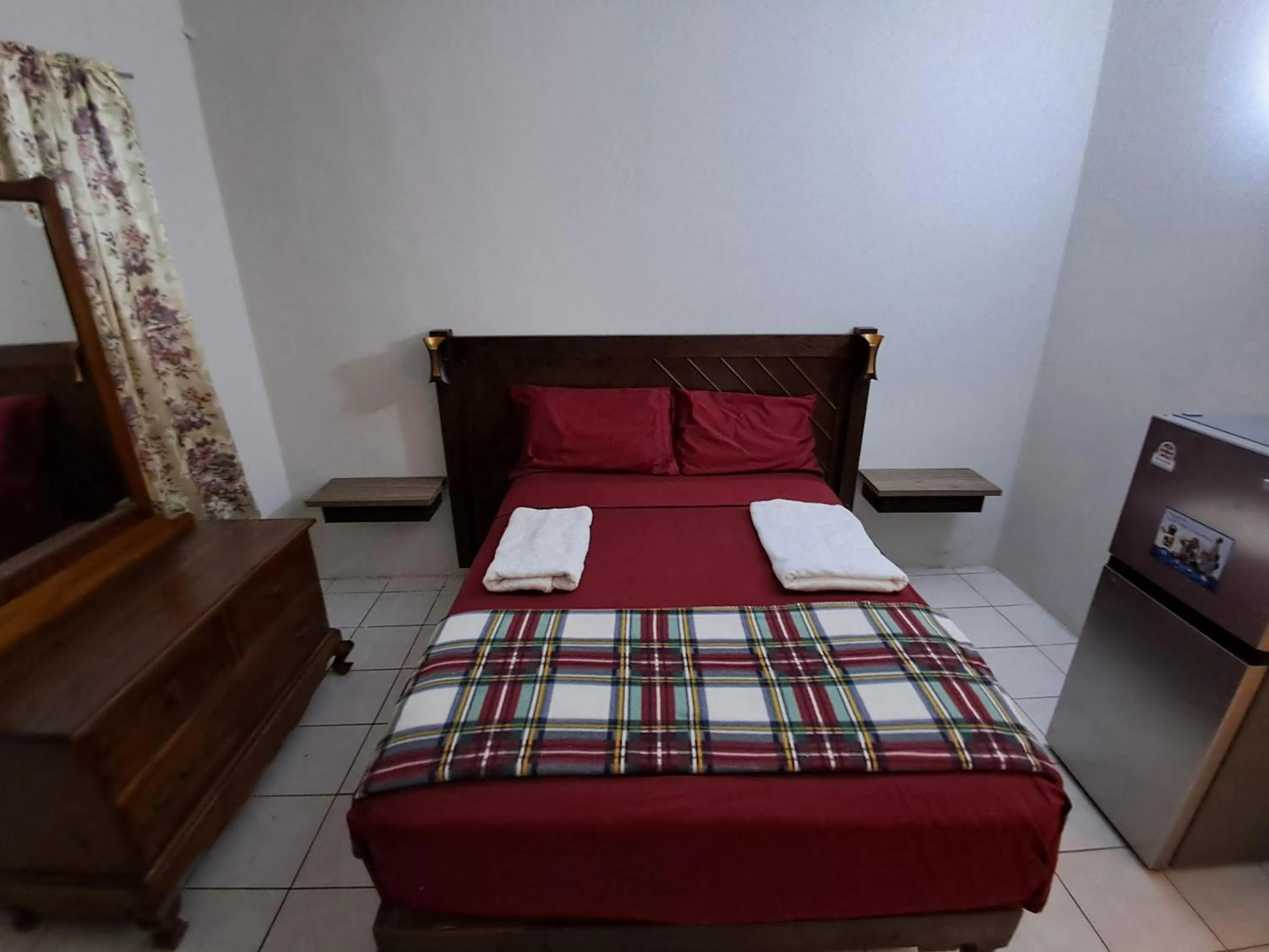 Bed in Barry's Rooms Negril