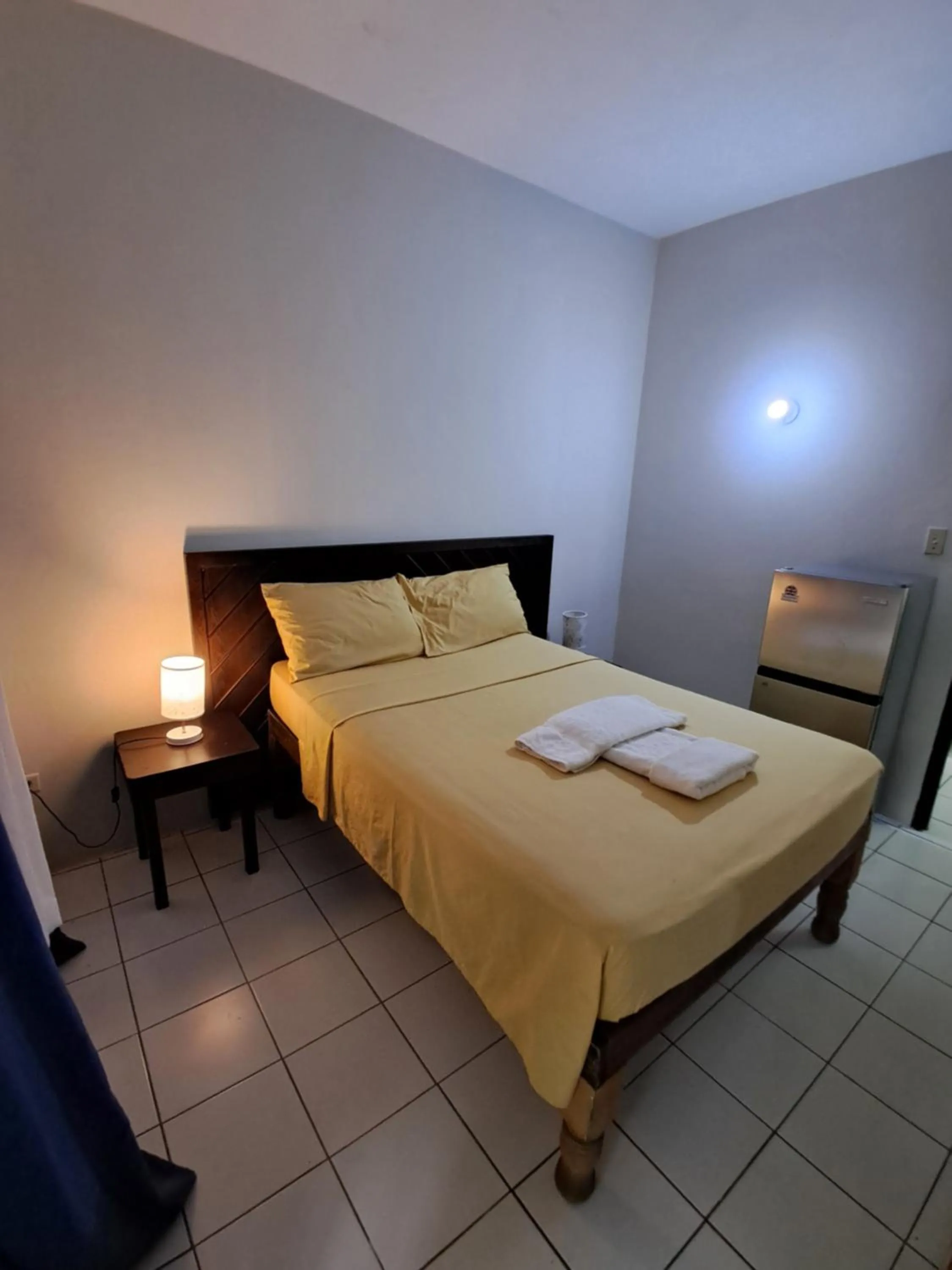 Bed in Barry's Rooms Negril