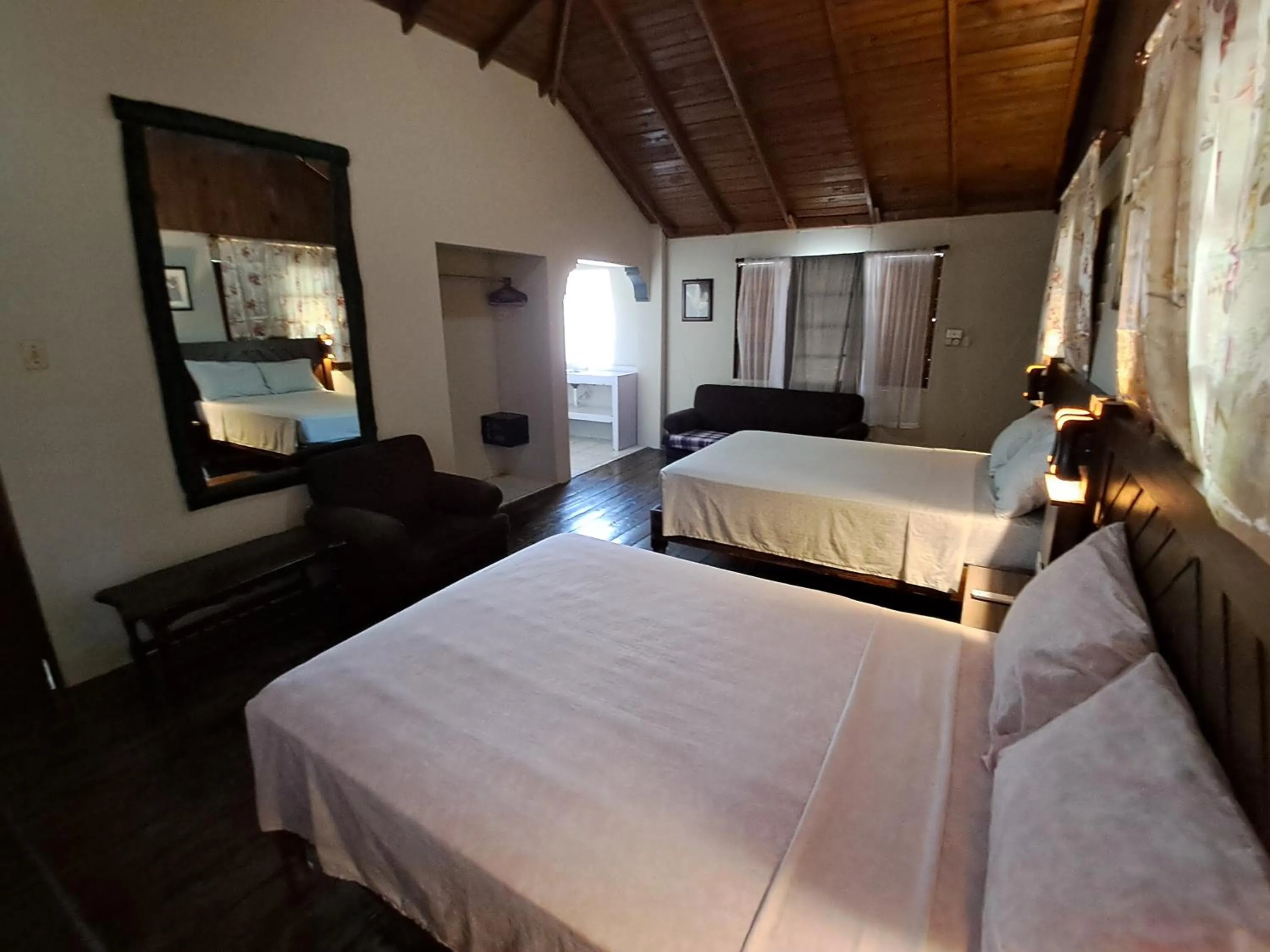 Bed in Barry's Rooms Negril