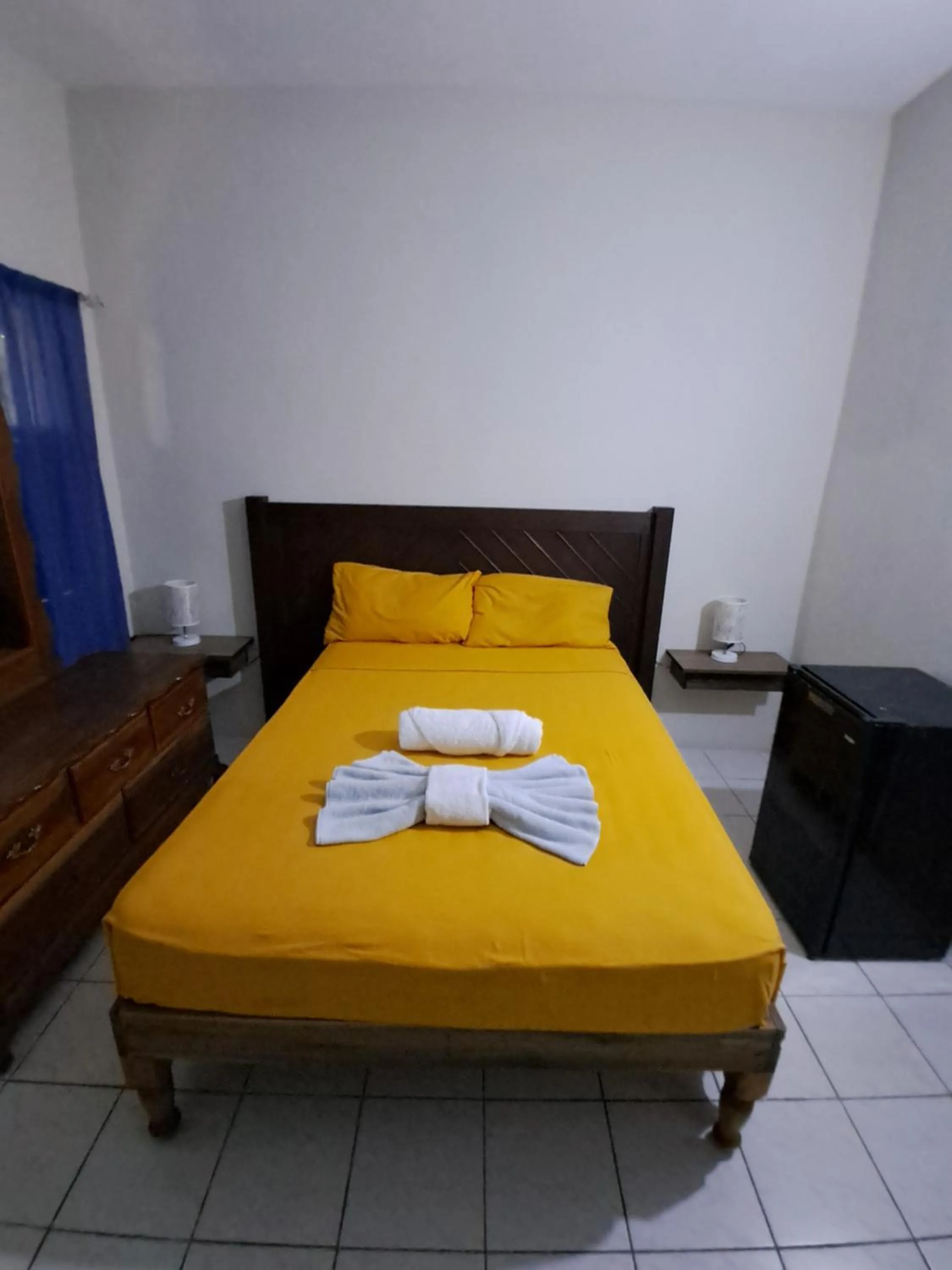 Bed in Barry's Rooms Negril