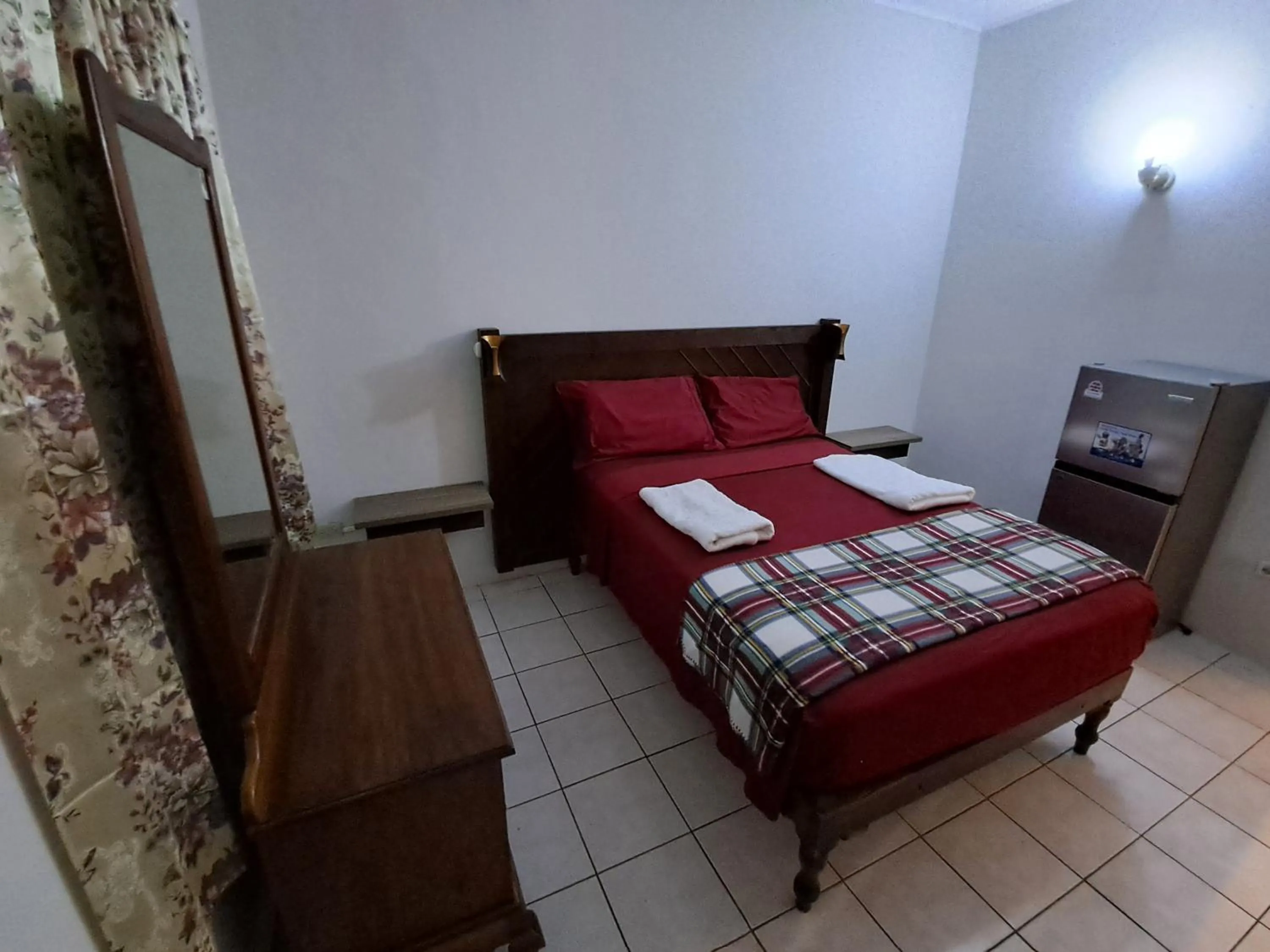 Bed in Barry's Rooms Negril
