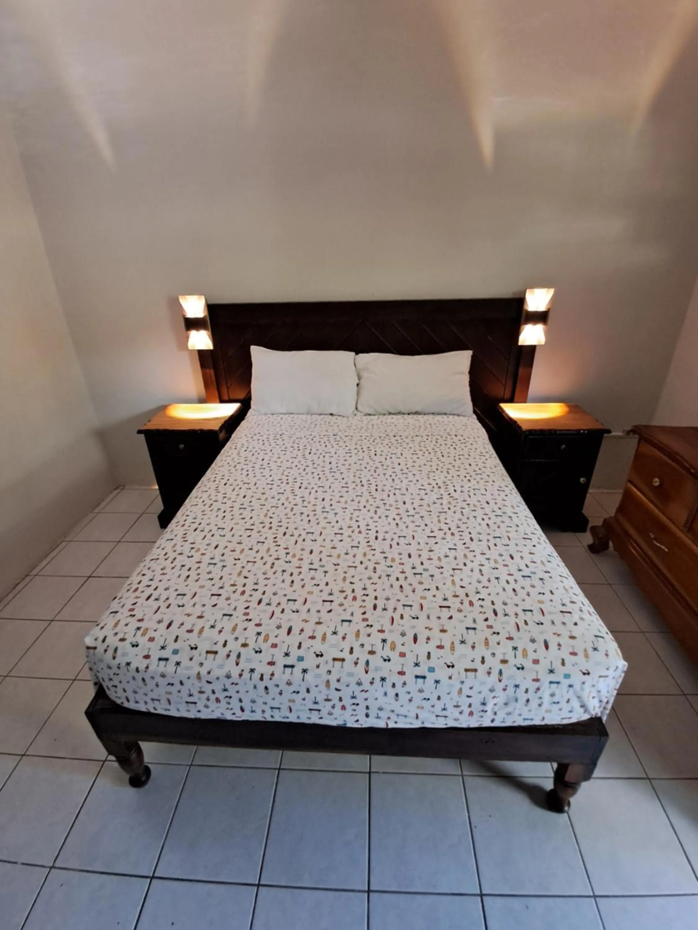 Bed in Barry's Rooms Negril