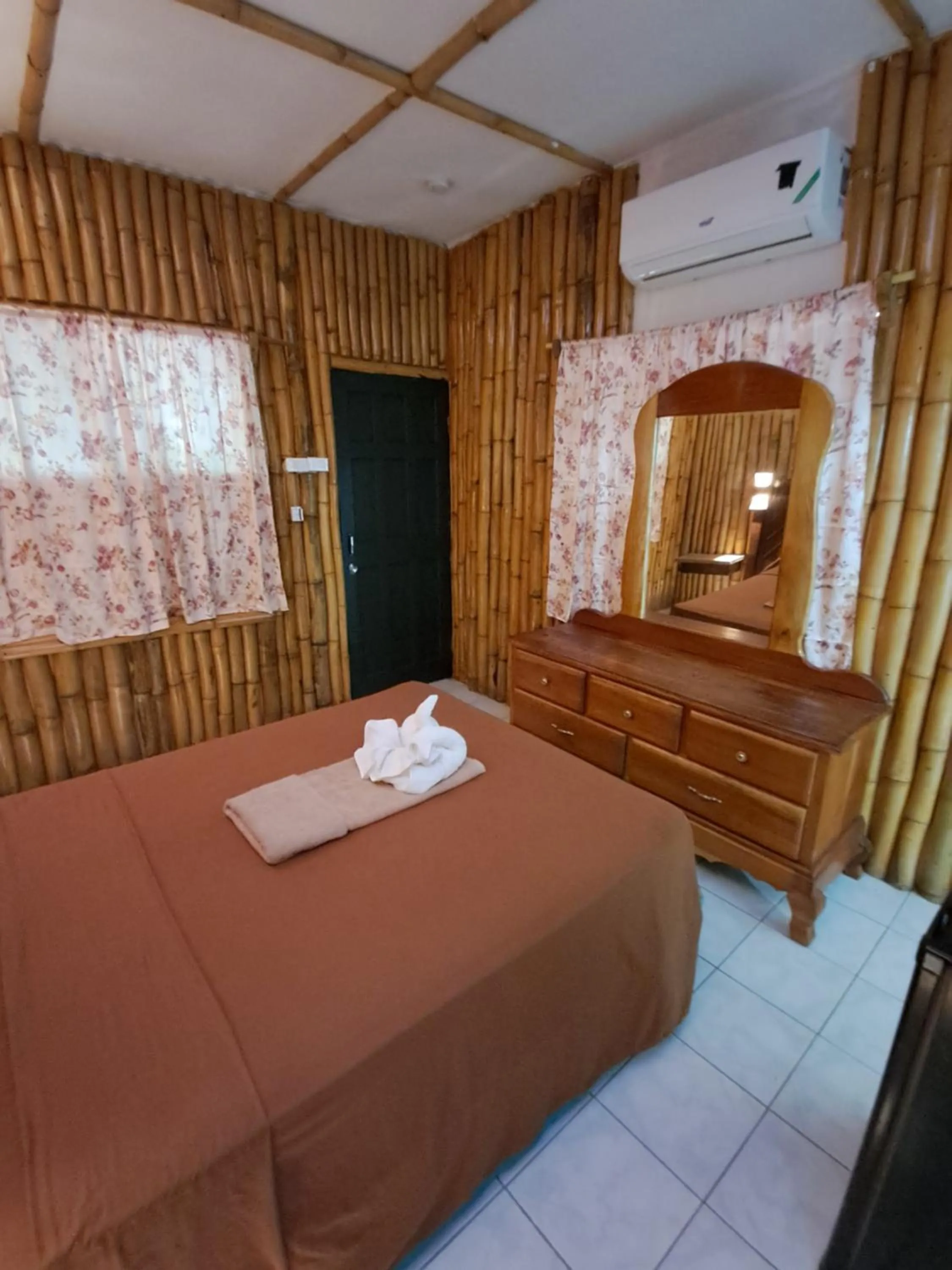 Bed in Barry's Rooms Negril