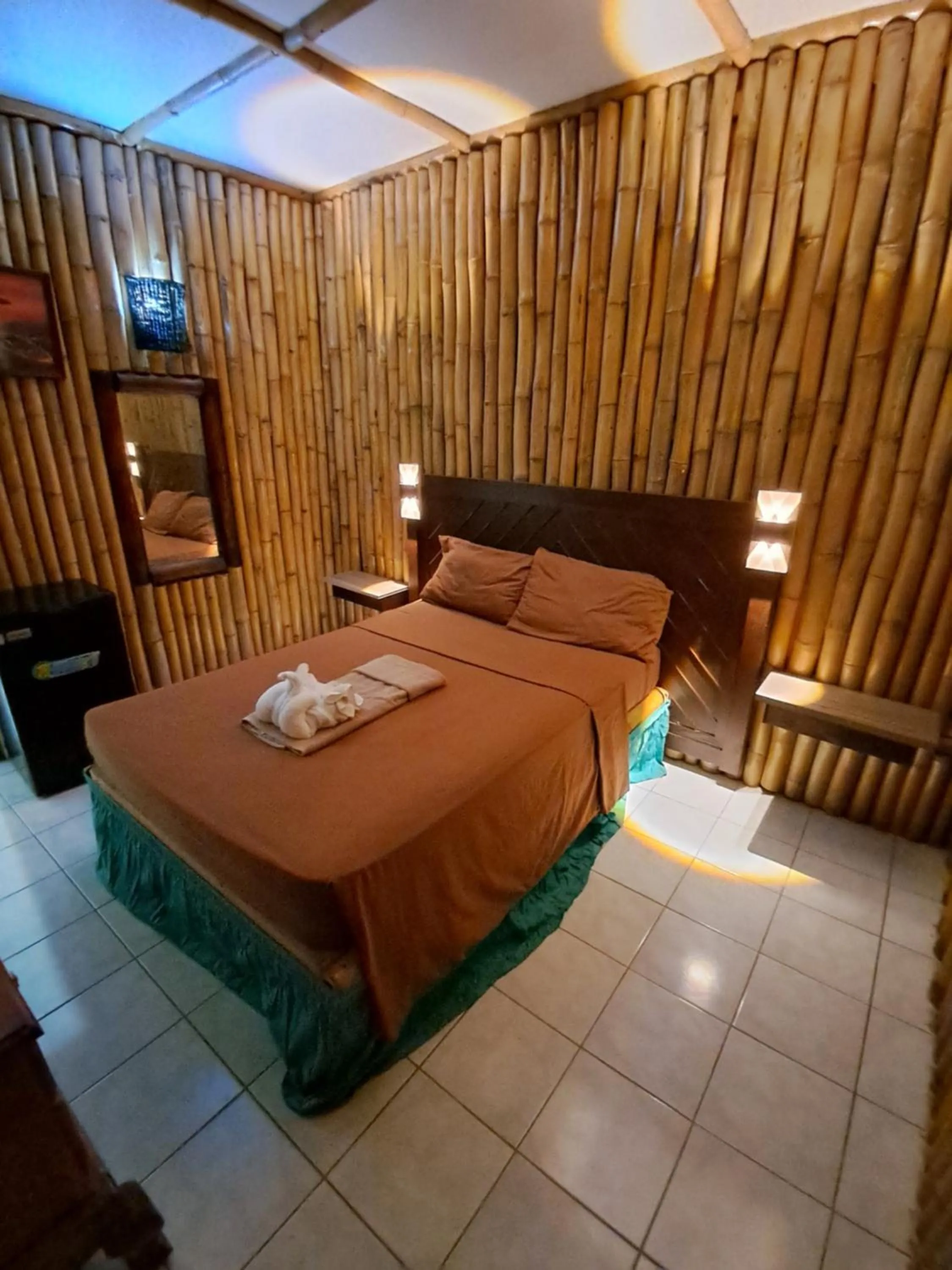 Bed in Barry's Rooms Negril