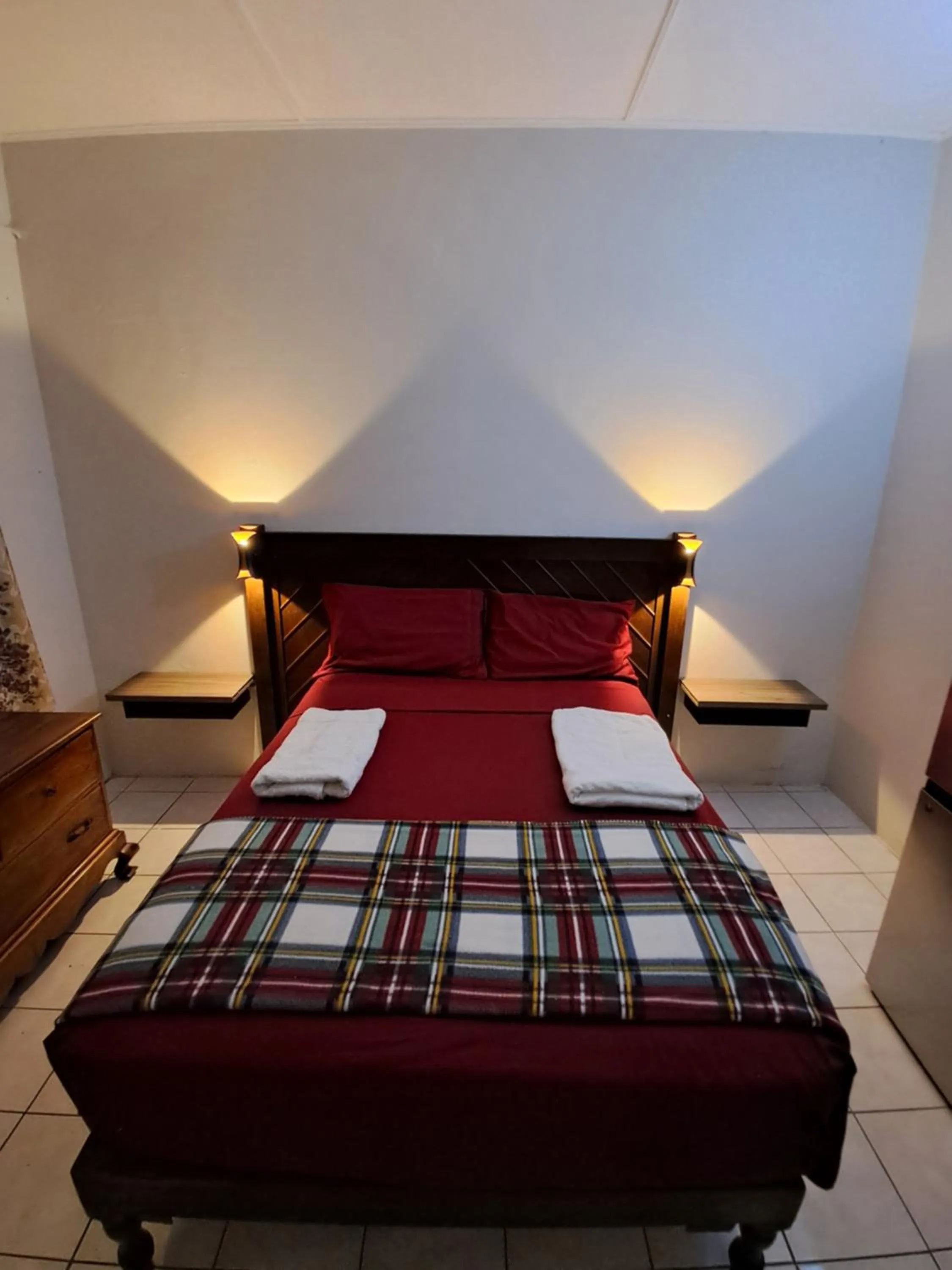Bed in Barry's Rooms Negril
