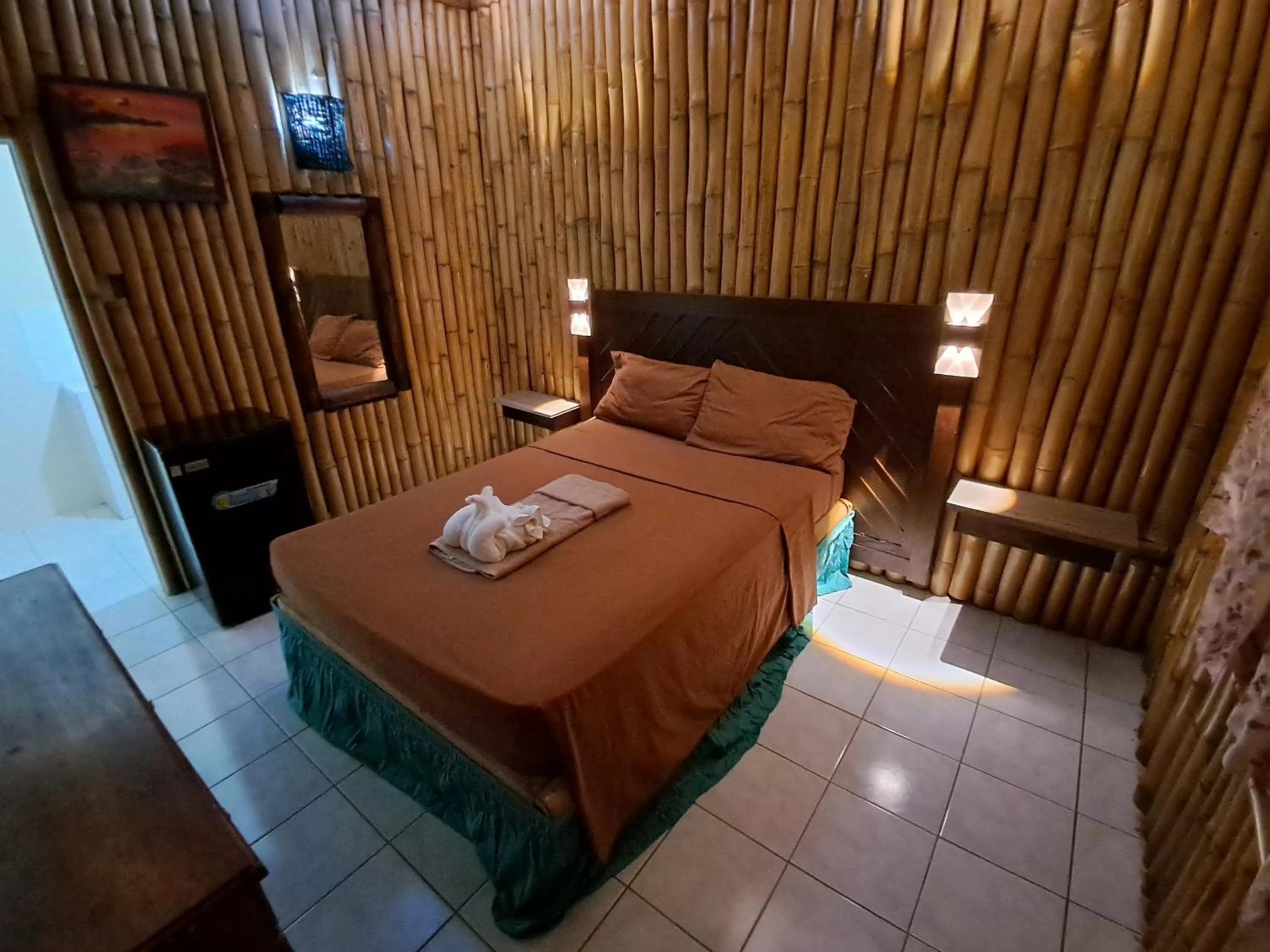 Bed in Barry's Rooms Negril