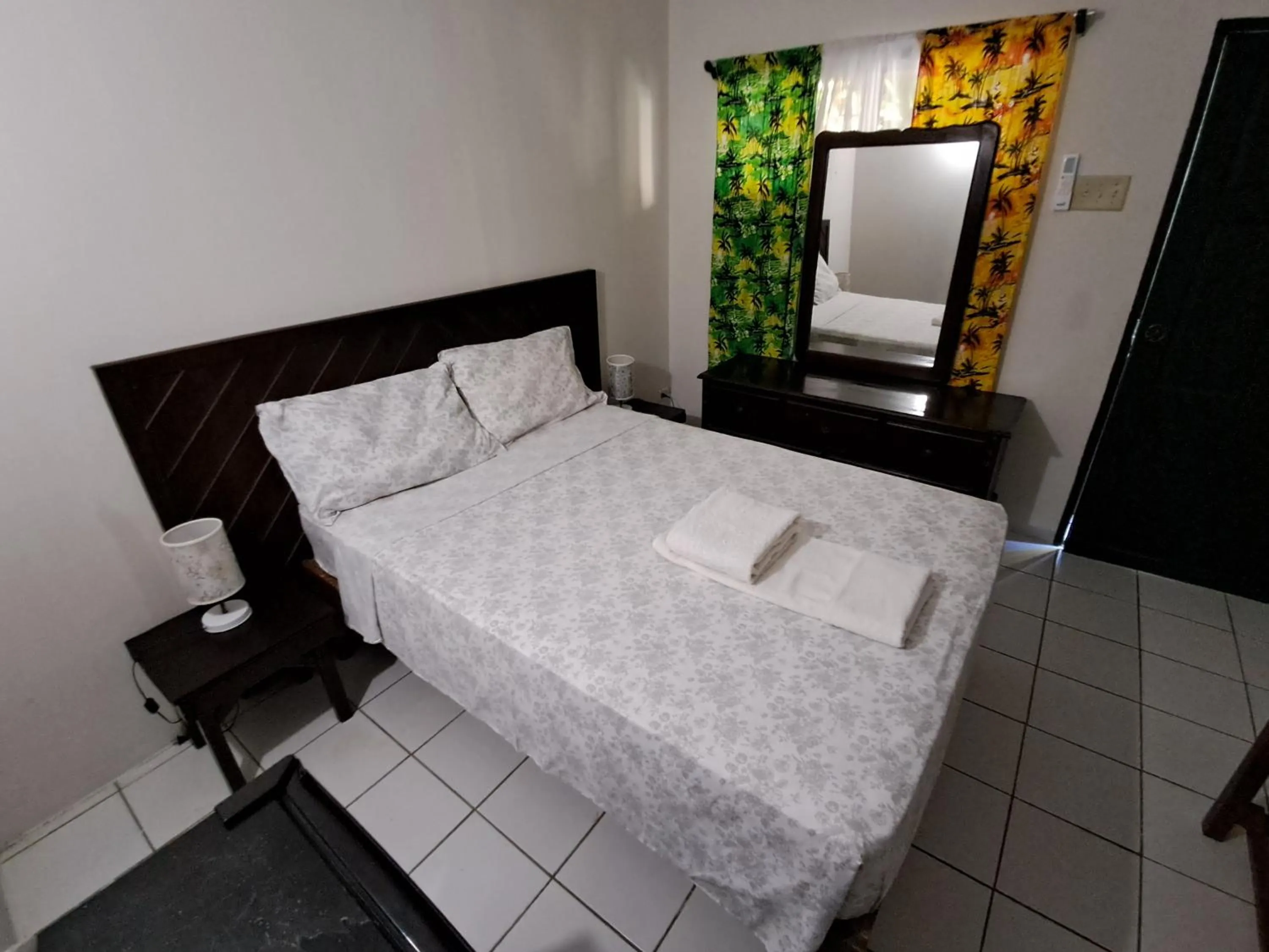 Bed in Barry's Rooms Negril