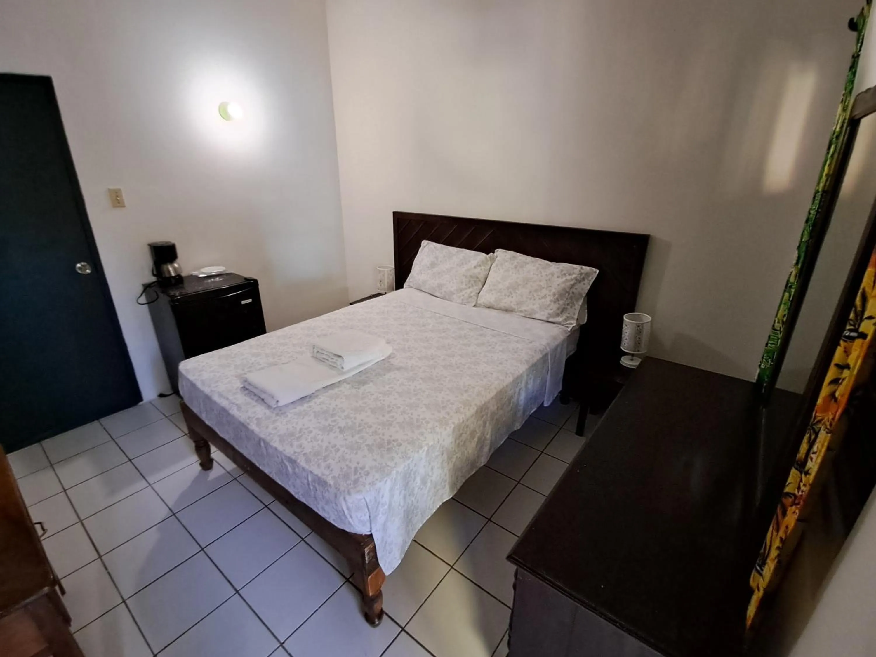Bed in Barry's Rooms Negril