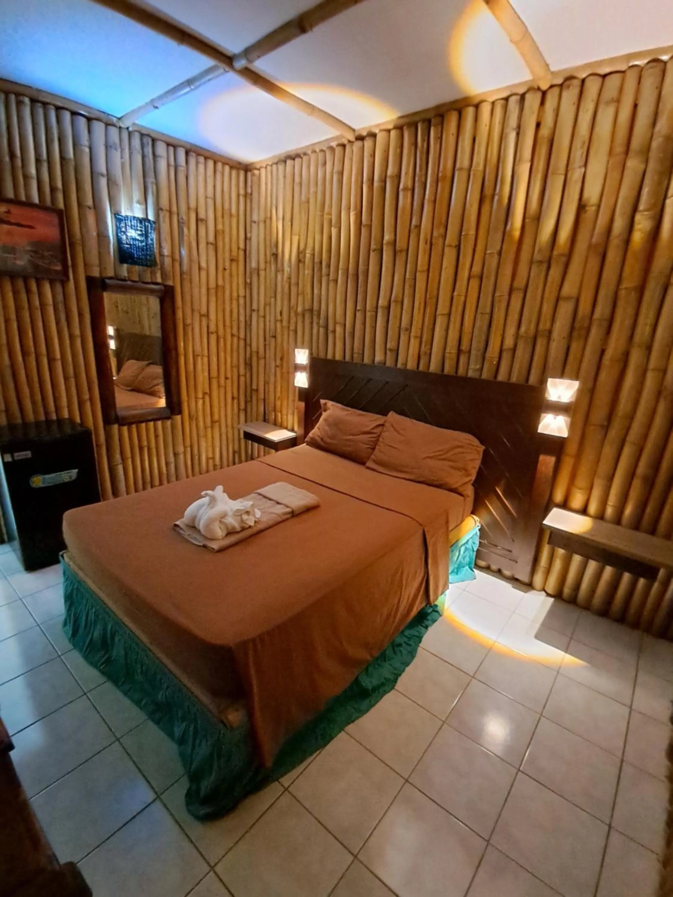 Bed in Barry's Rooms Negril