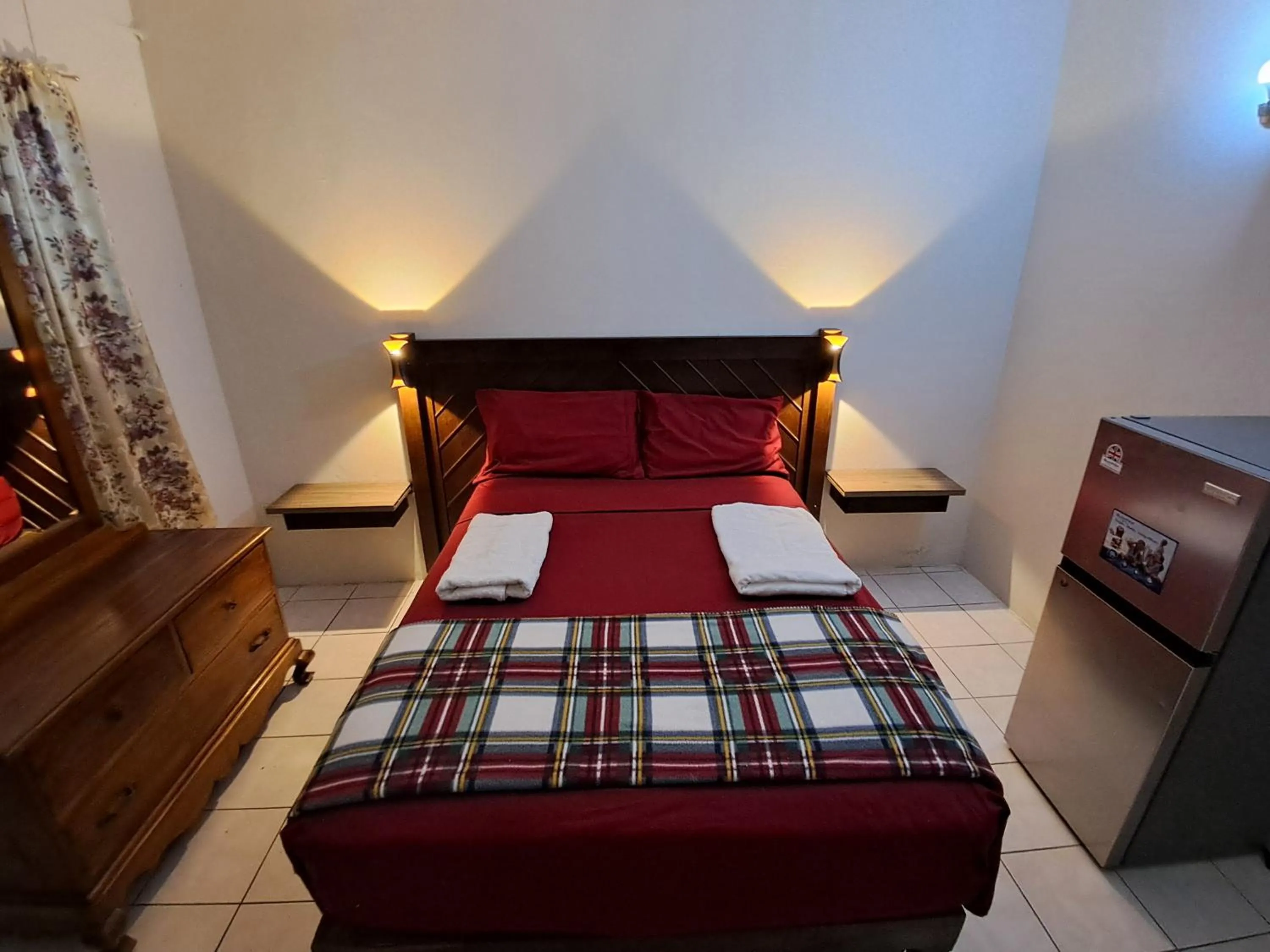 Bed in Barry's Rooms Negril