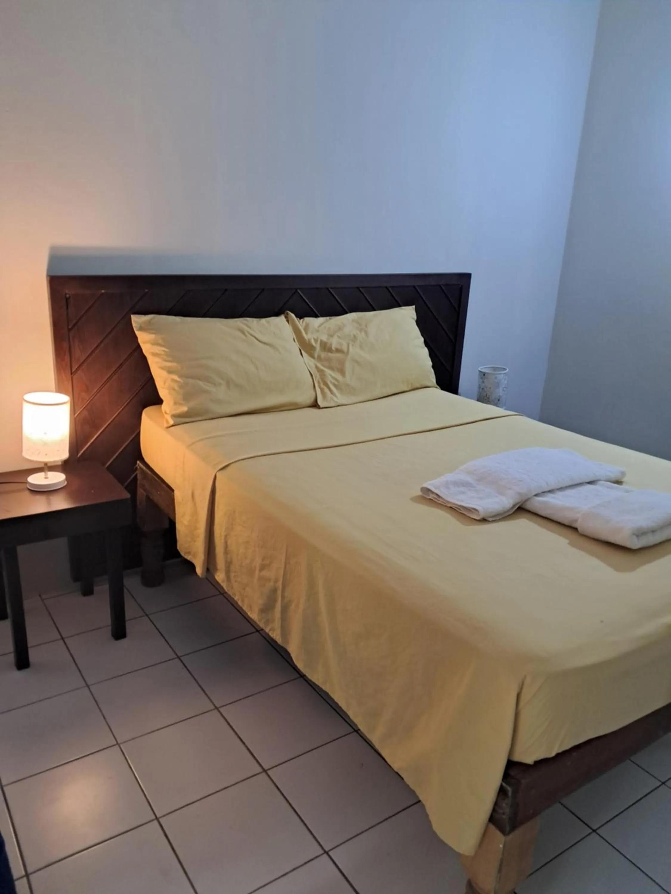 Bed in Barry's Rooms Negril
