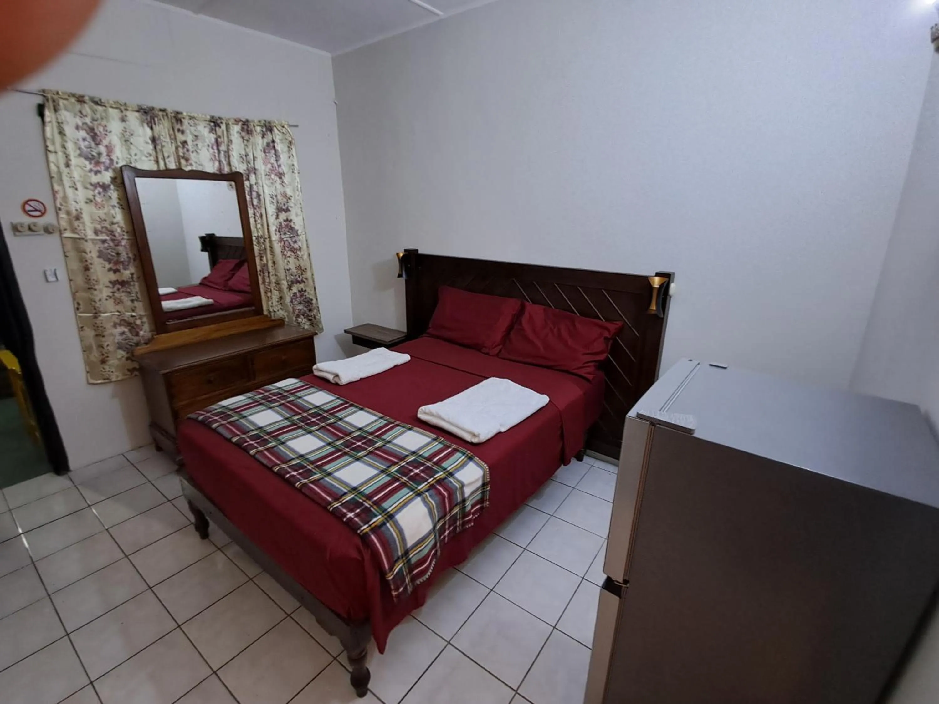 Bed in Barry's Rooms Negril
