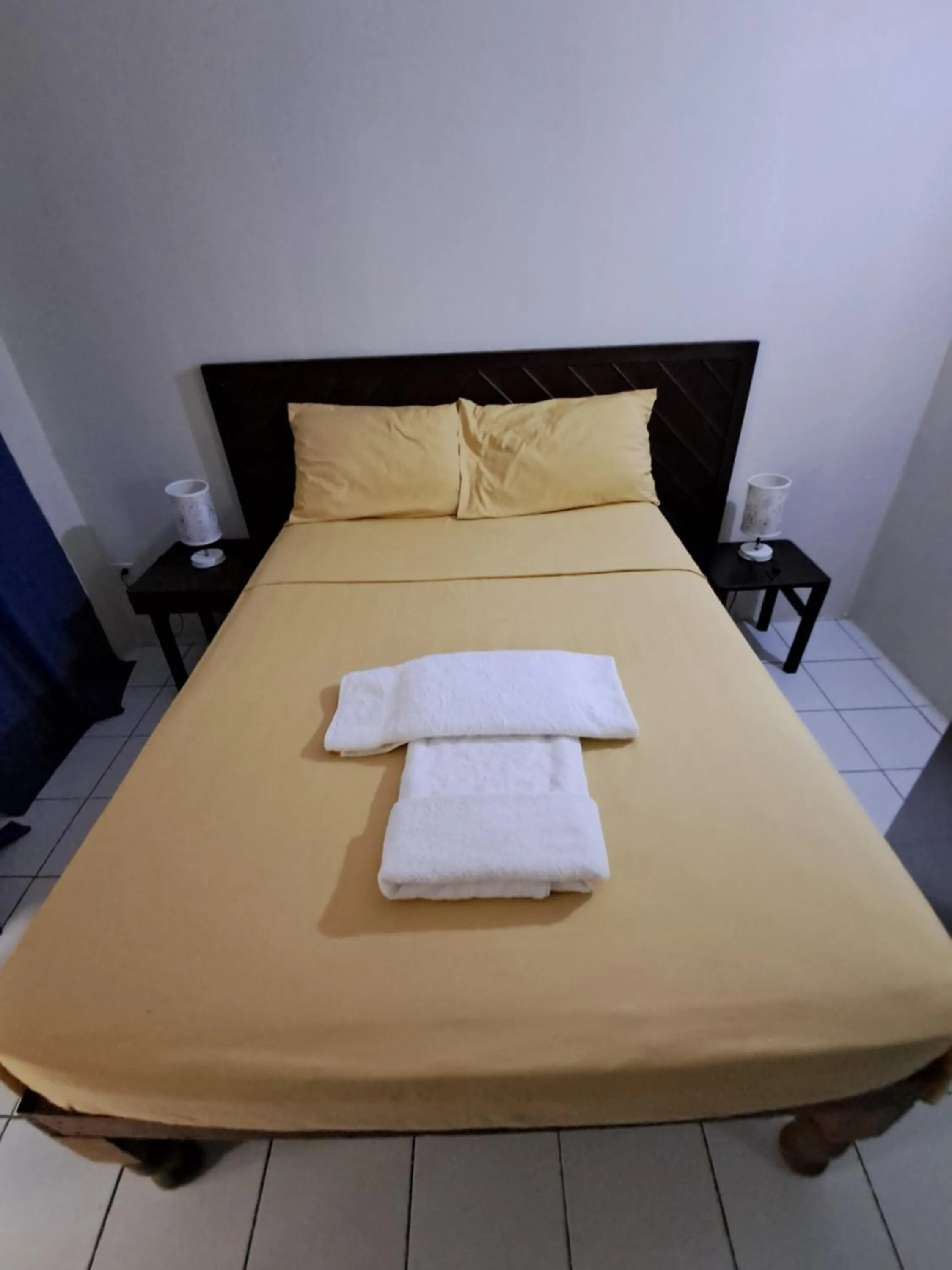 Bed in Barry's Rooms Negril