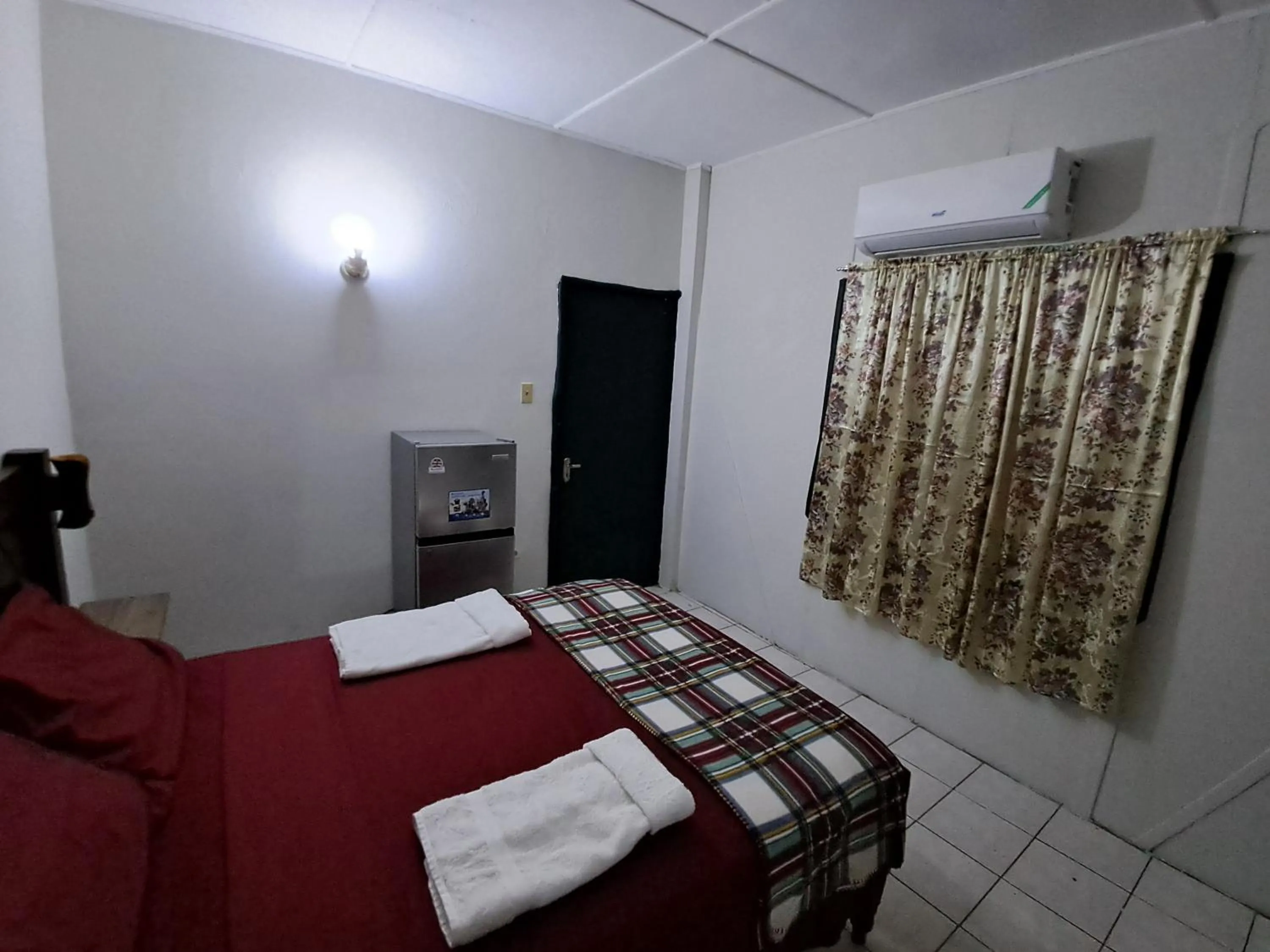 Bed in Barry's Rooms Negril