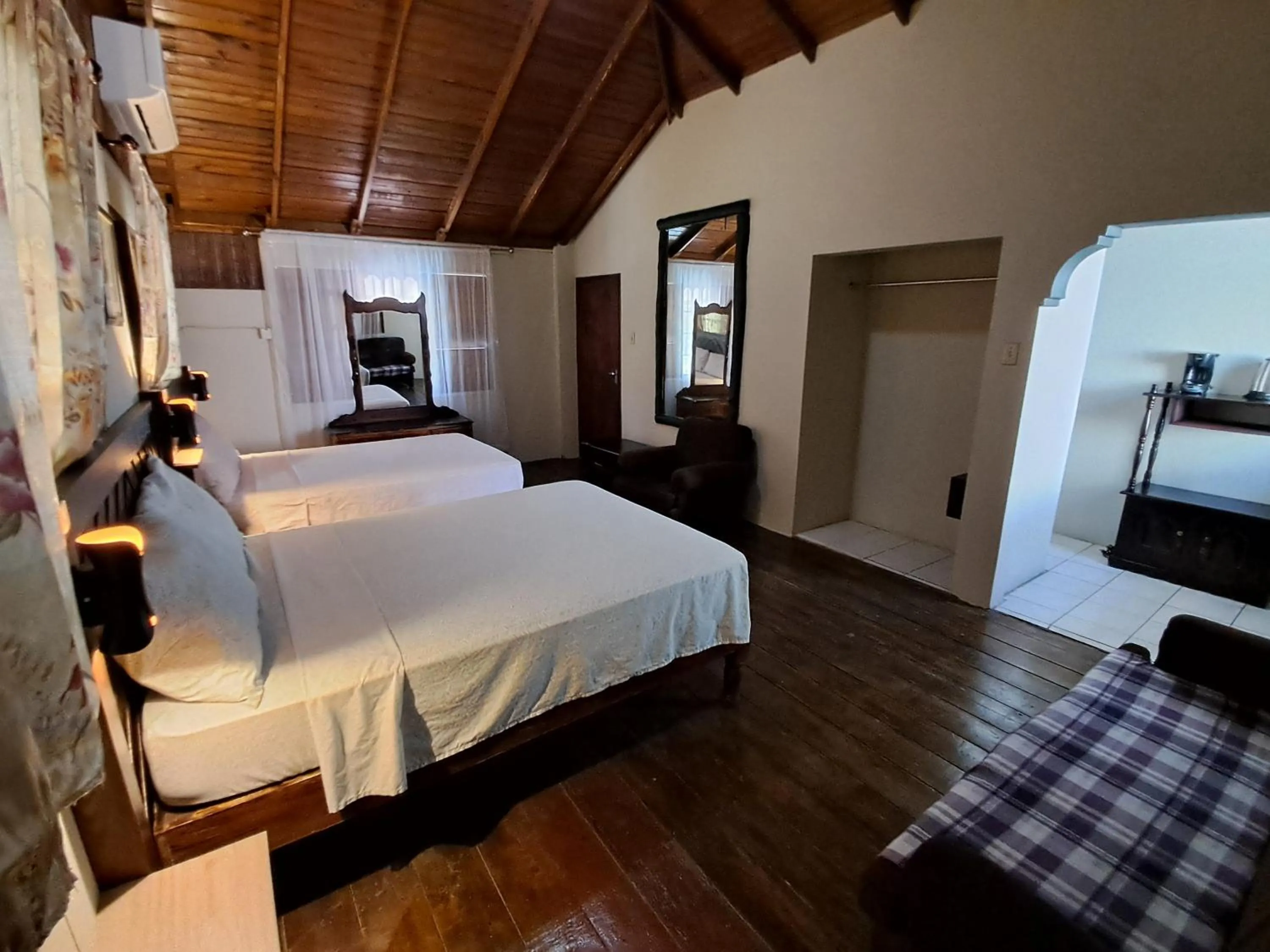 Bed in Barry's Rooms Negril