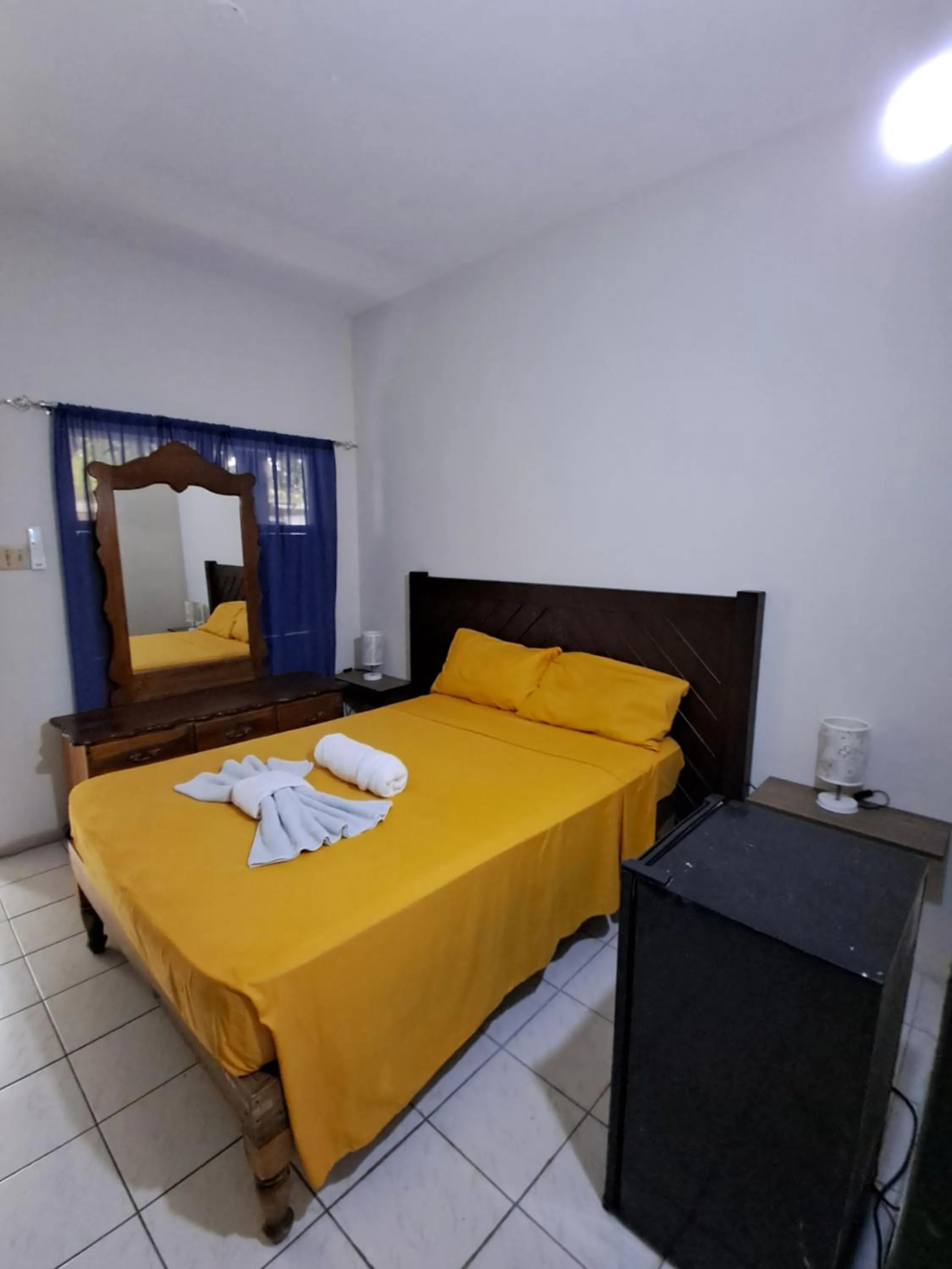 Bed in Barry's Rooms Negril
