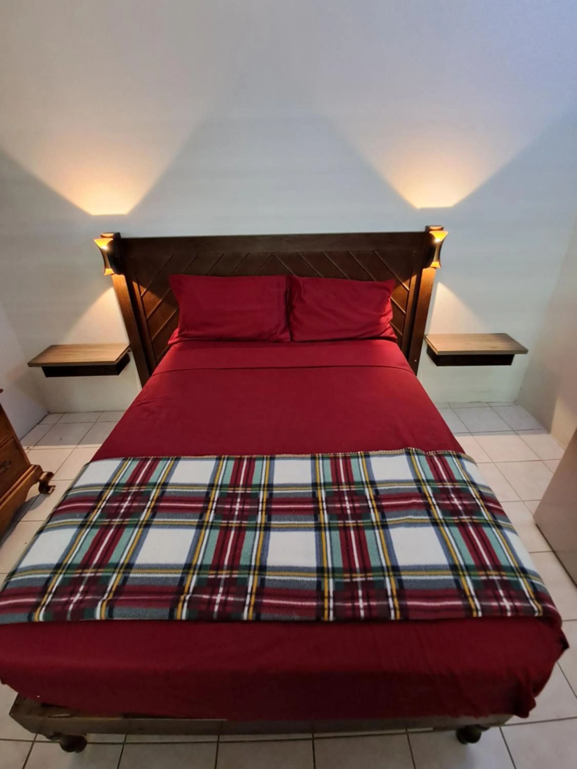 Bed in Barry's Rooms Negril