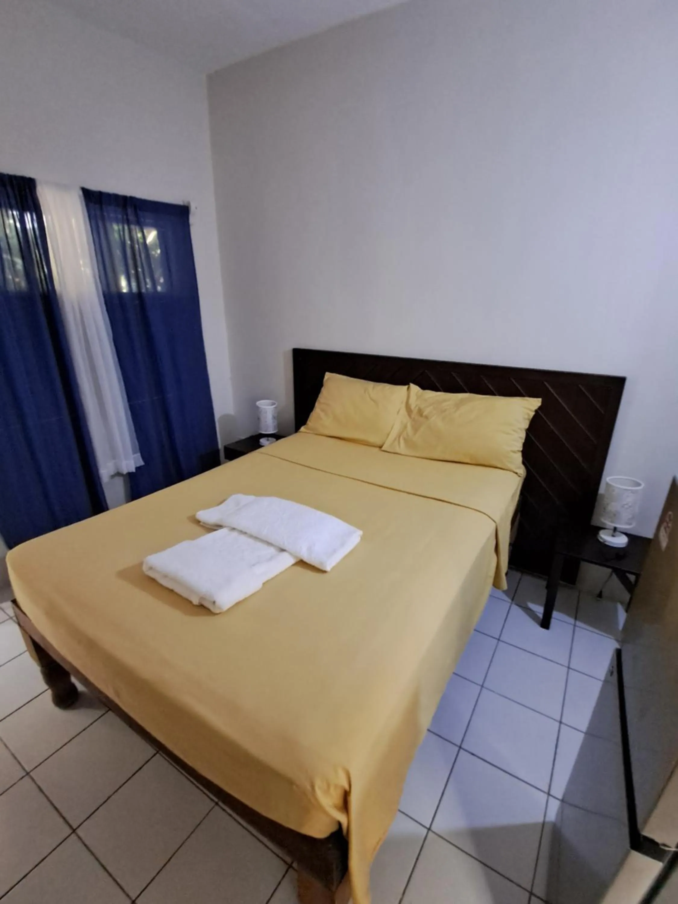 Bed in Barry's Rooms Negril