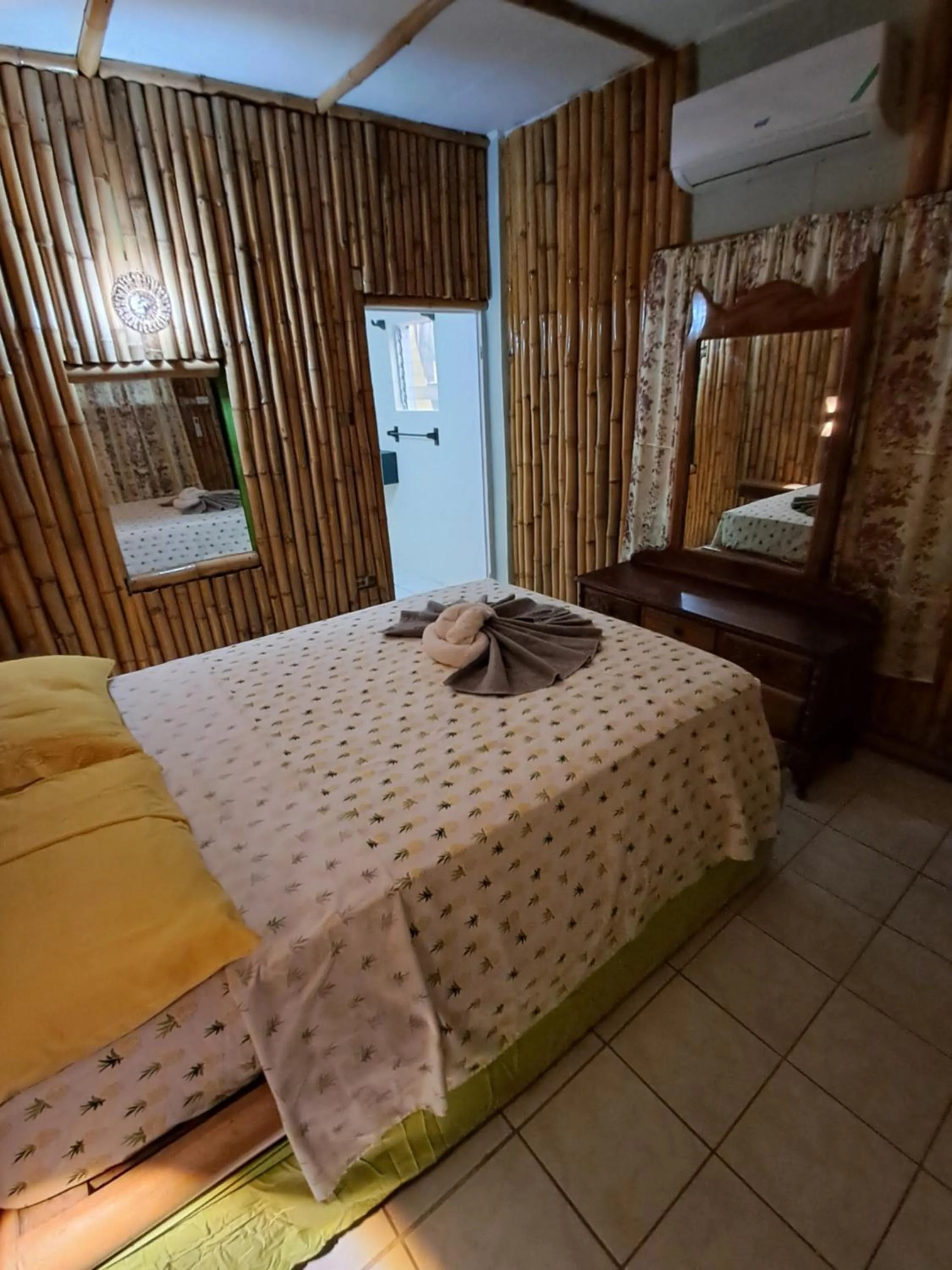 Bed in Barry's Rooms Negril