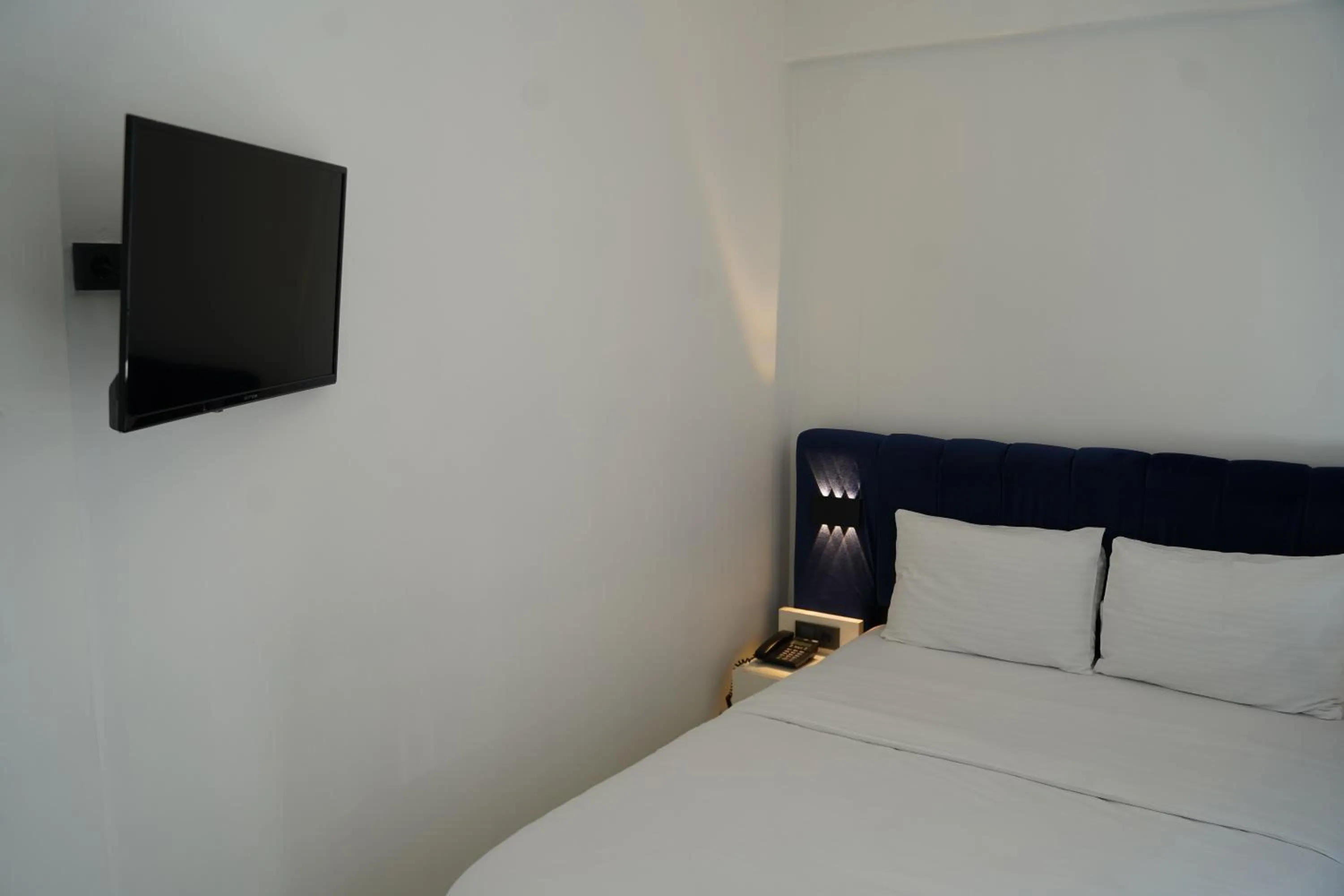 Bed in Sword Suit Hotel