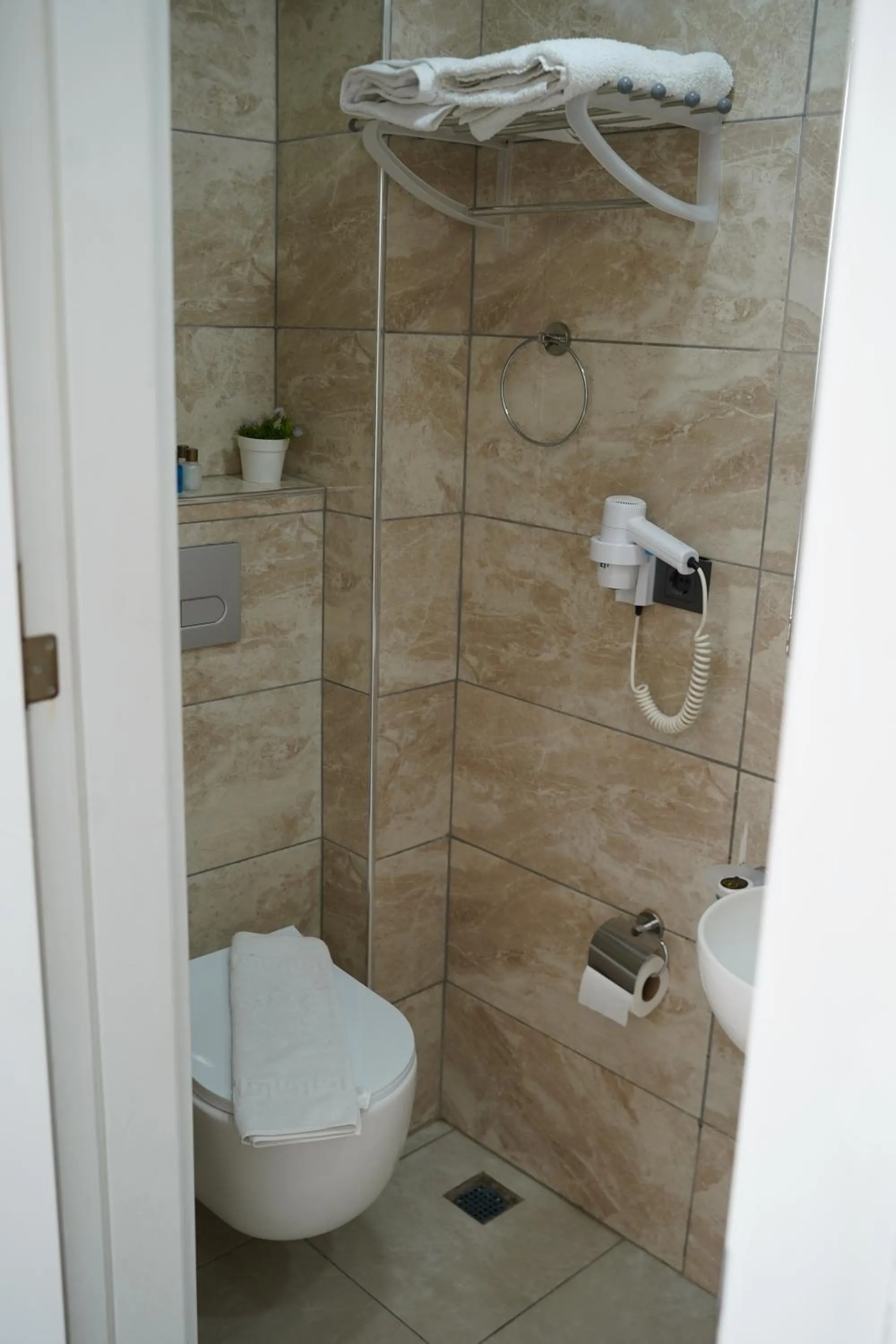 Toilet in Sword Suit Hotel