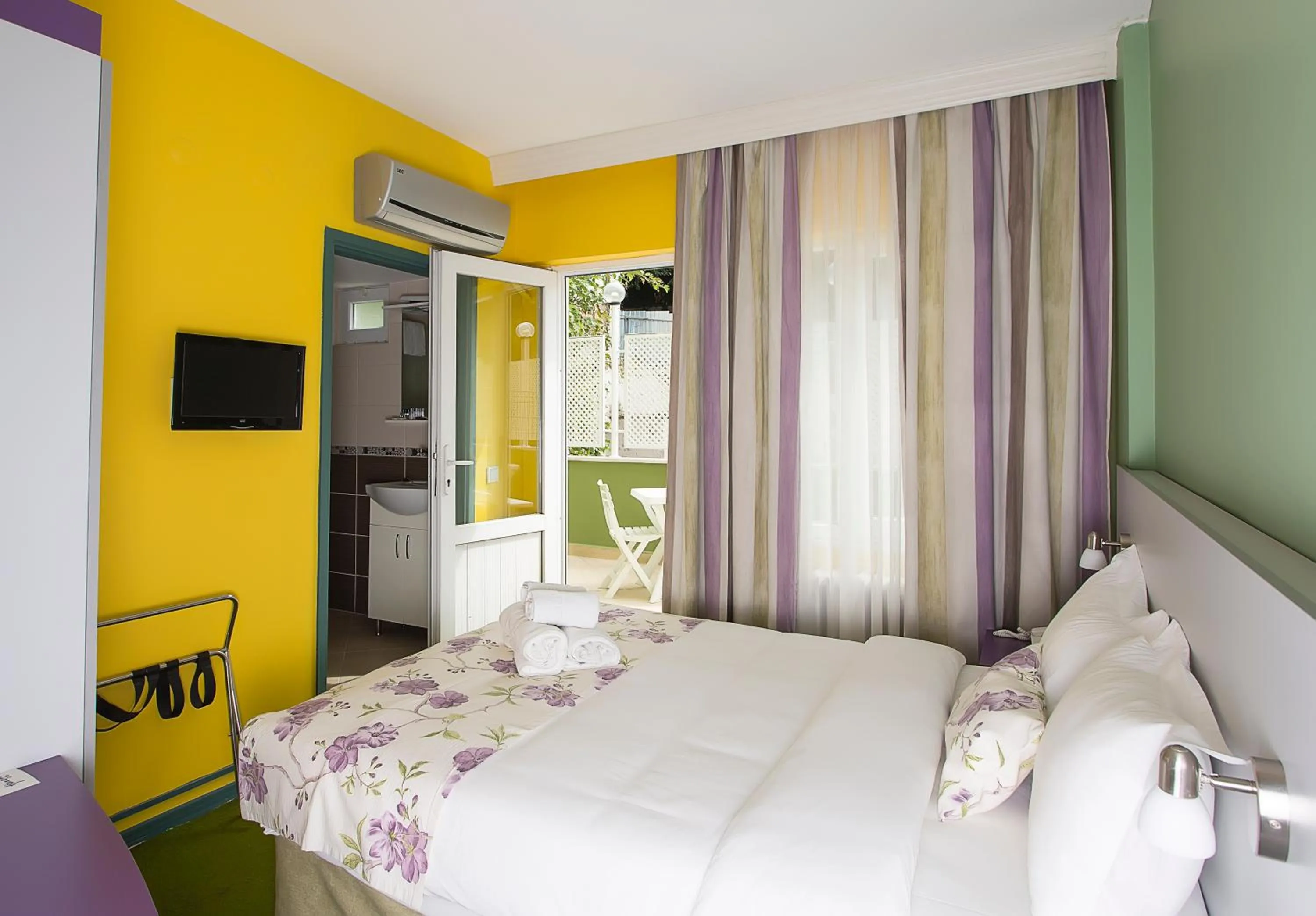 Bed in Mini Harem Hotel