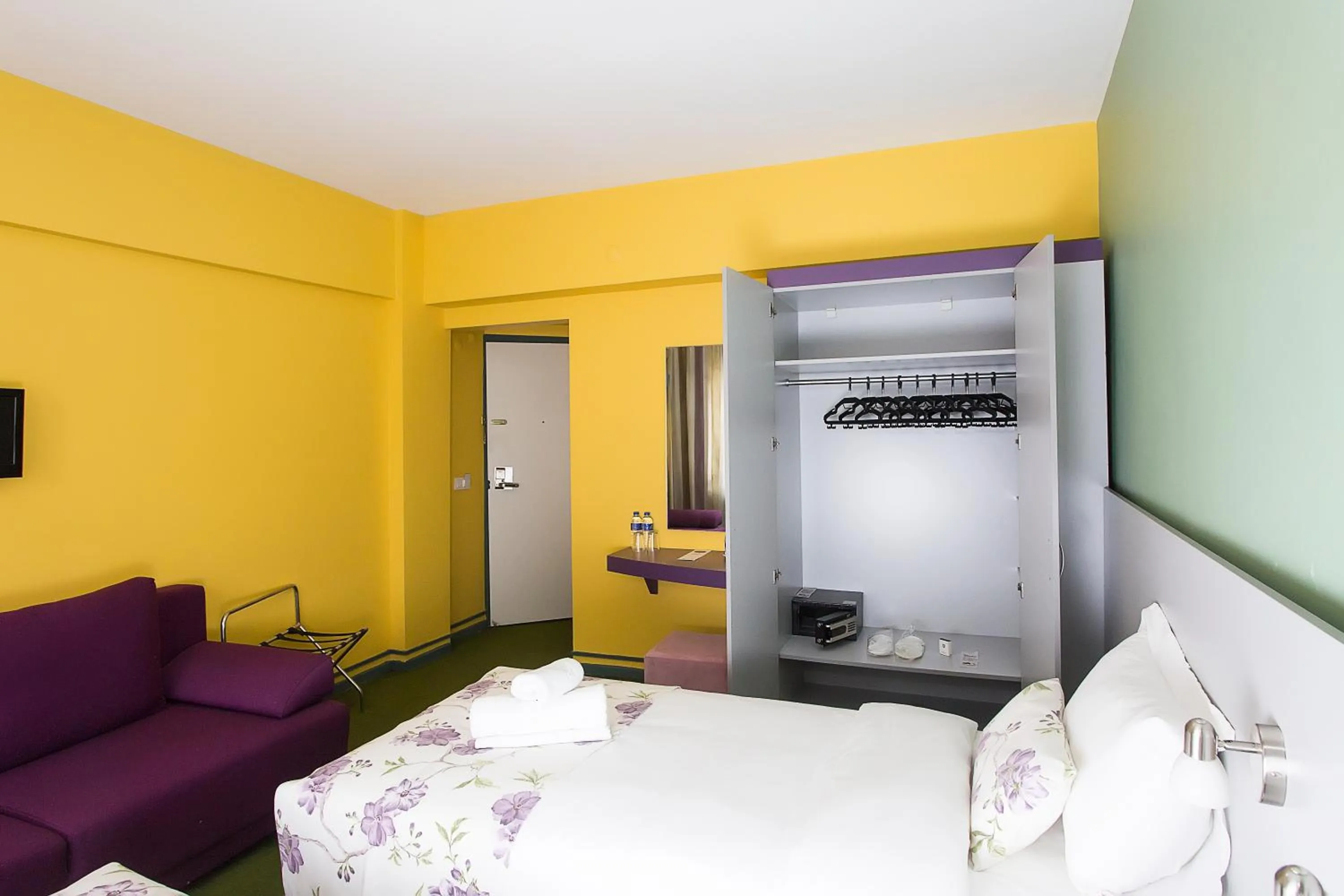 Bed in Mini Harem Hotel