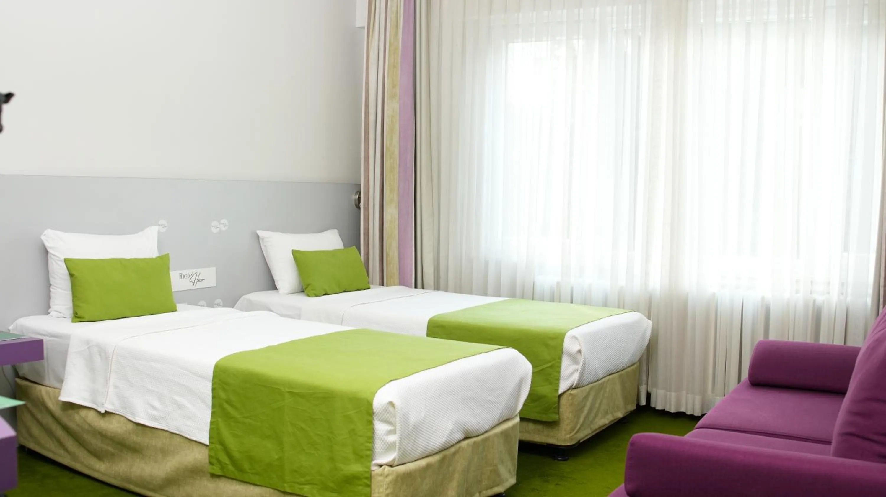 Bed in Mini Harem Hotel