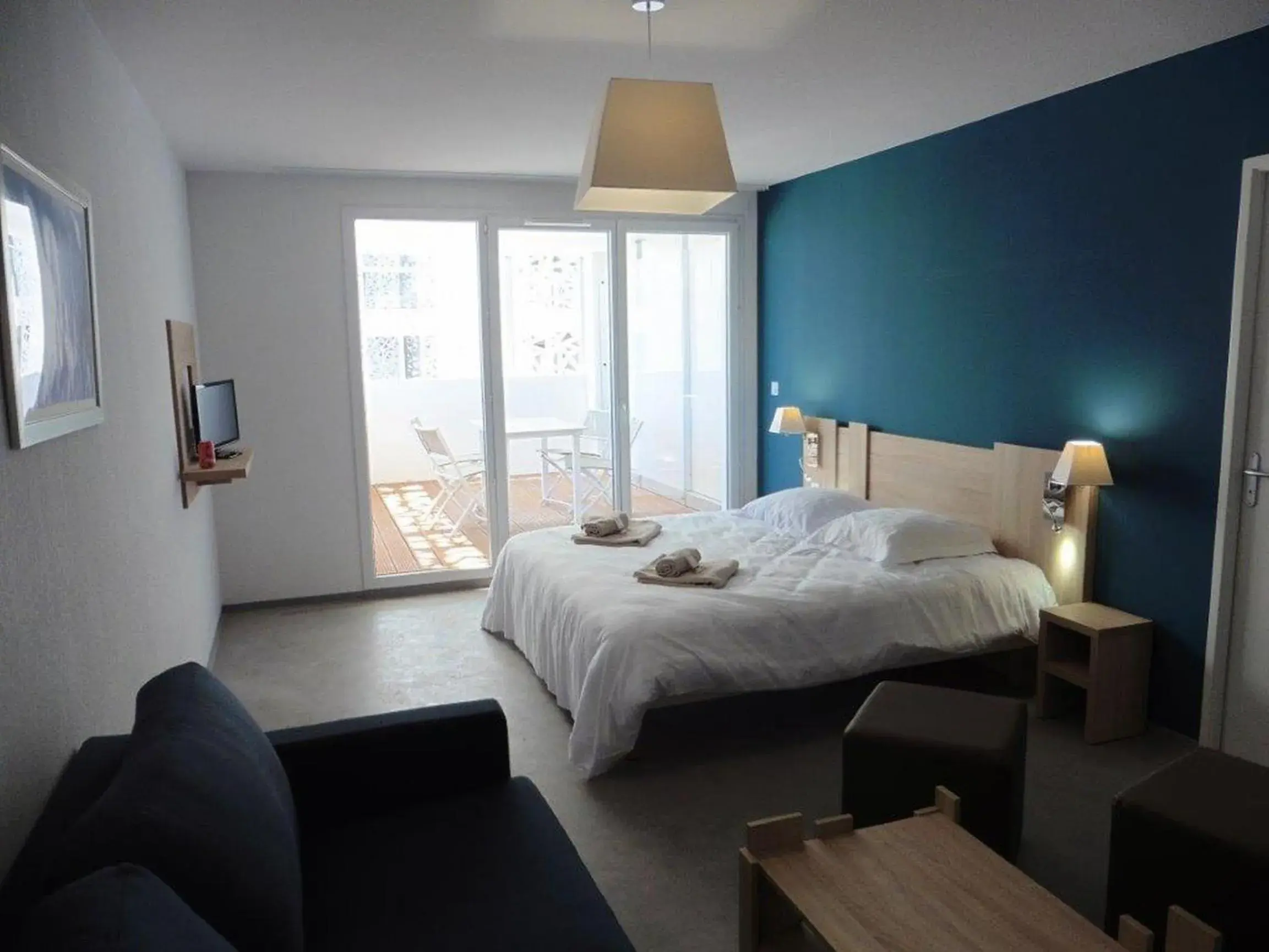 Living room, Bed in Appart'Hotel Prestige Odalys Nakâra Living room, Bed in Appart'Hotel Prestige Odalys Nakâra