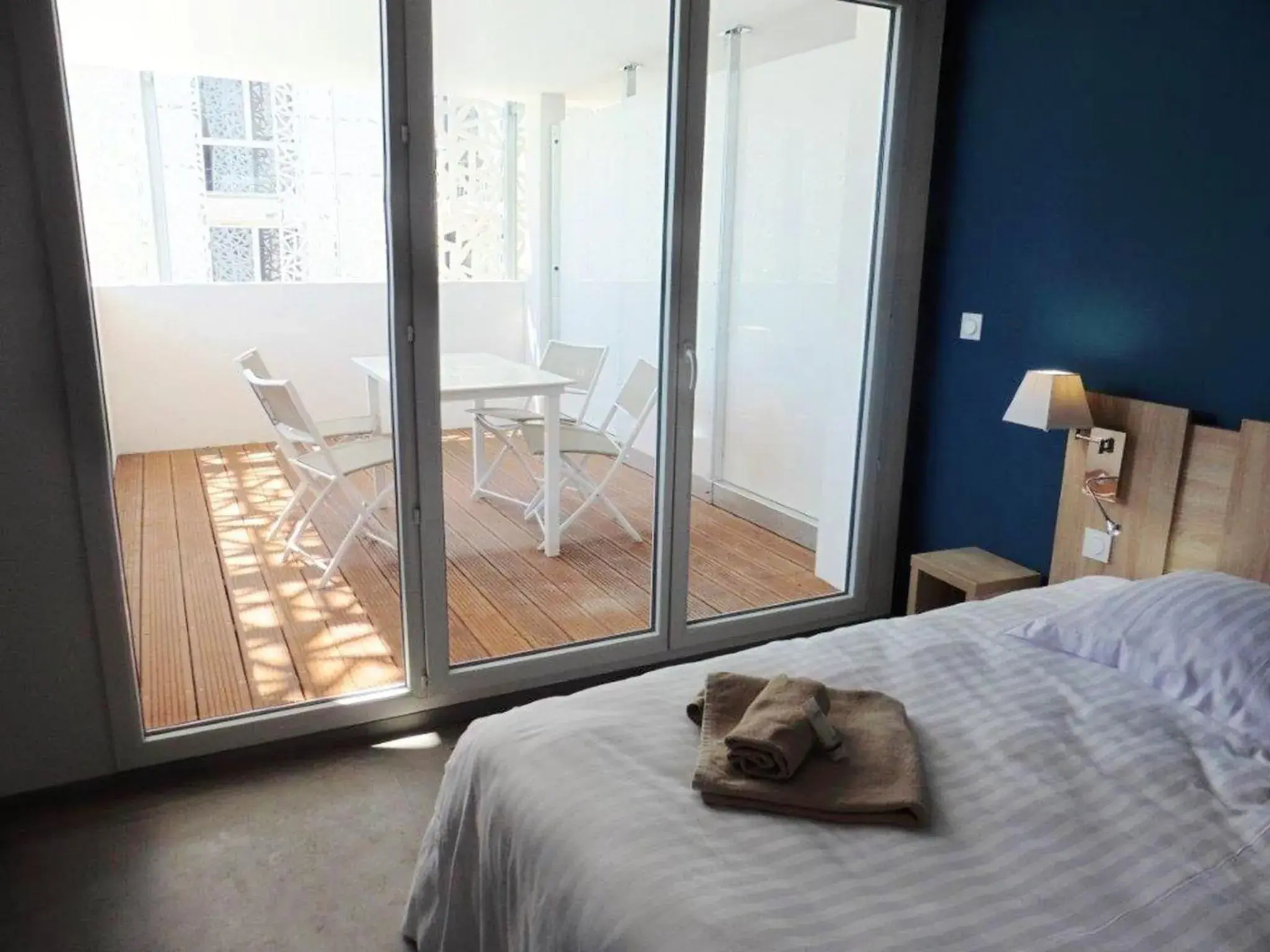 Balcony/Terrace, Bed in Appart'Hotel Prestige Odalys Nakâra Balcony/Terrace, Bed in Appart'Hotel Prestige Odalys Nakâra