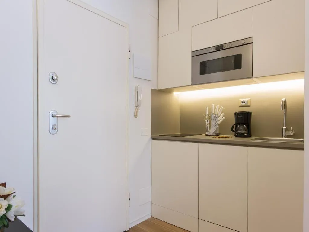 Kitchen or kitchenette in Locanda dei Poeti Rooms & Apartments
