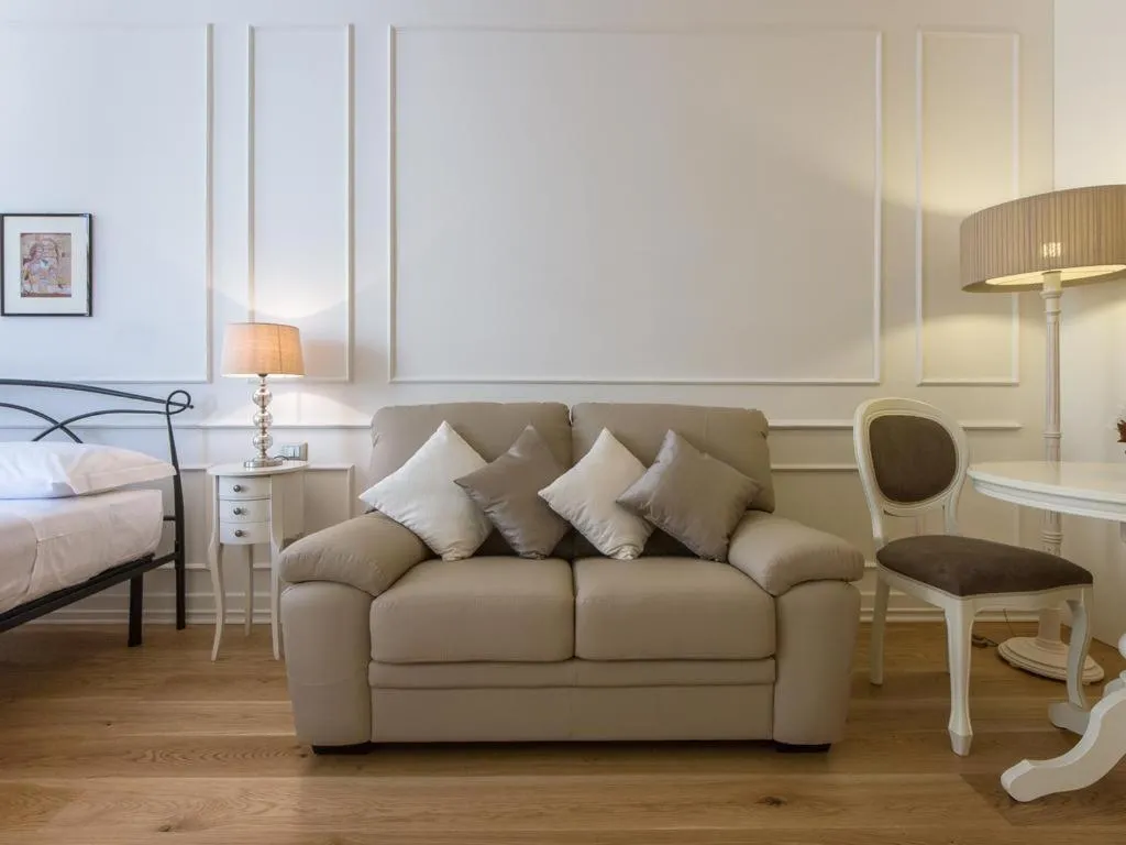 Living room, Bed in Locanda dei Poeti Rooms & Apartments