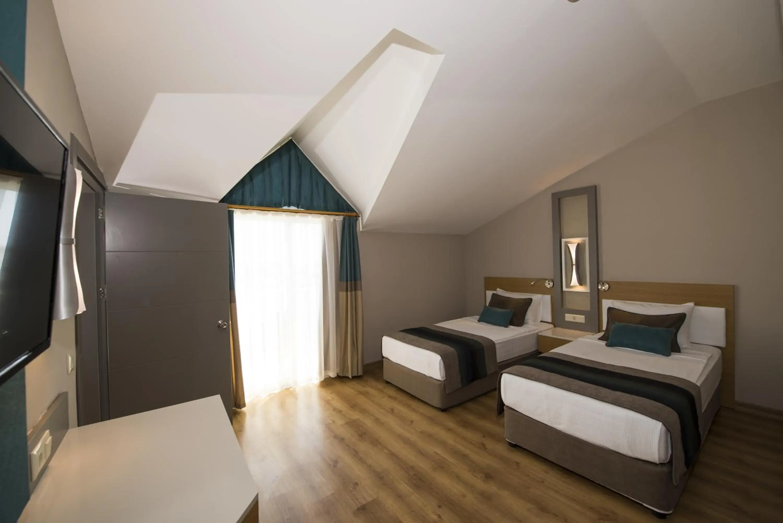 Bed in Palm World Side Resort & Spa Bed in Palm World Side Resort & Spa