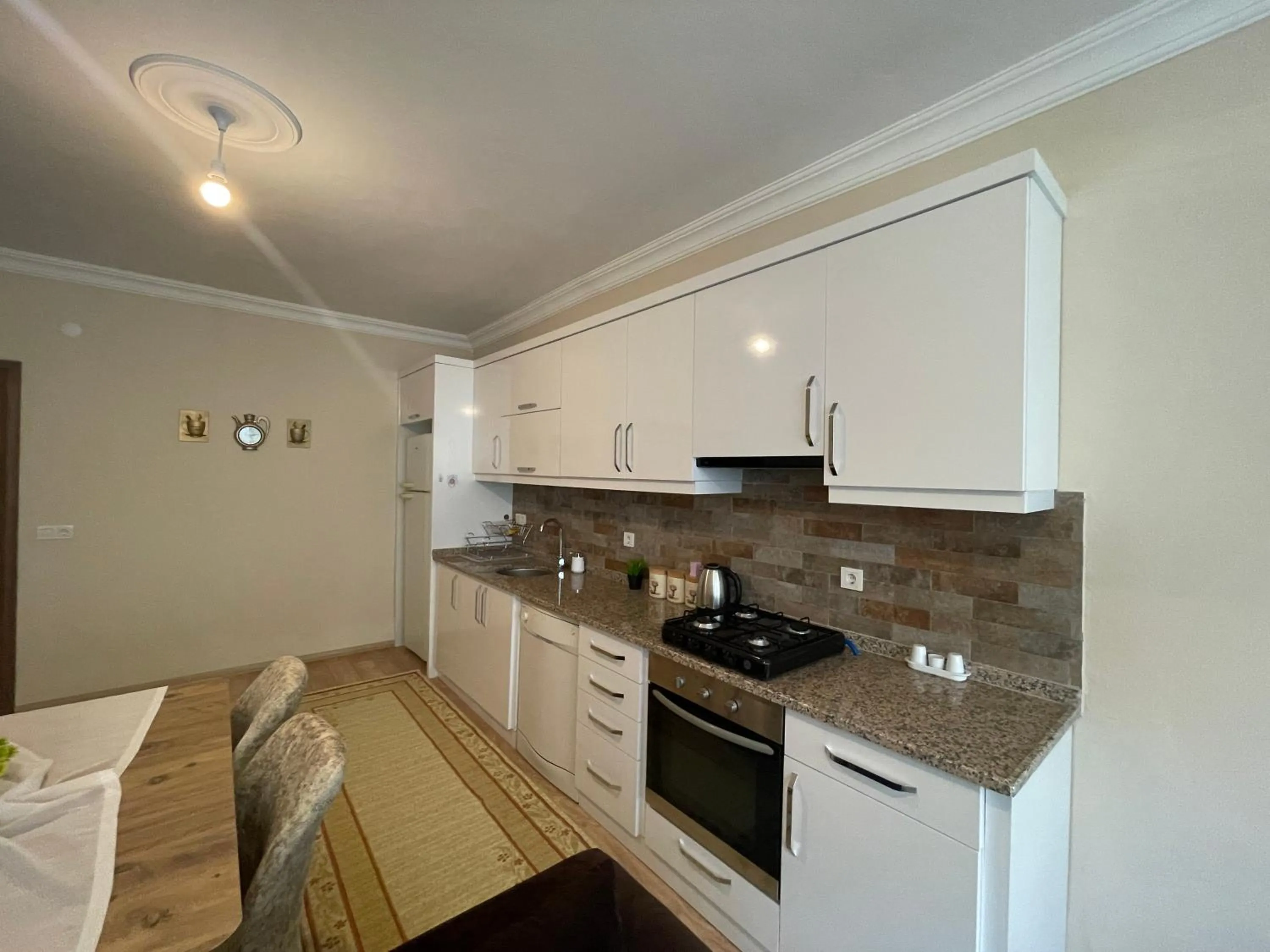 Kitchen or kitchenette in Select Suite & Apart Hotel