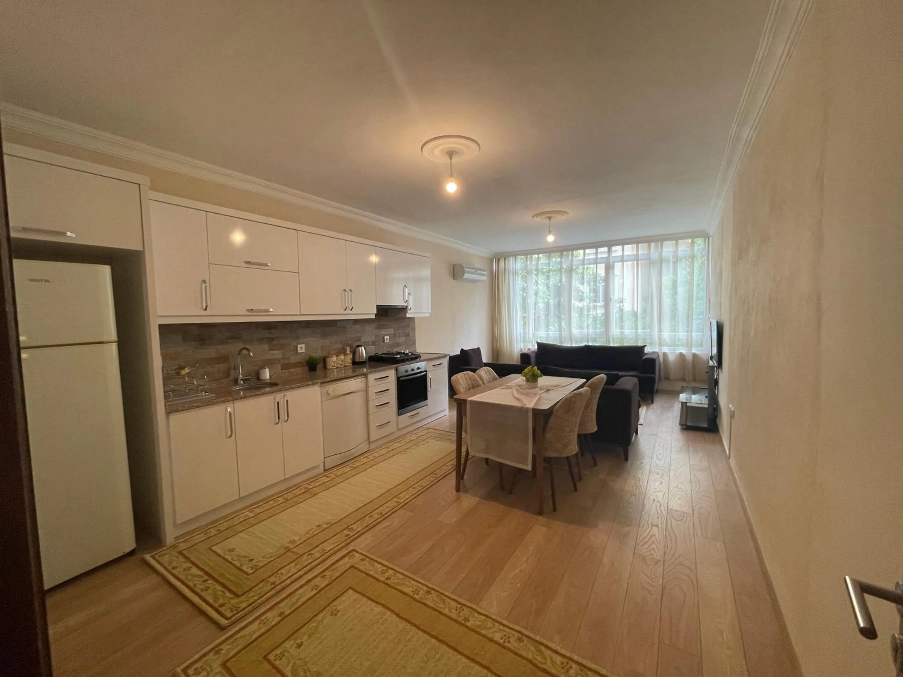 Kitchen or kitchenette in Select Suite & Apart Hotel