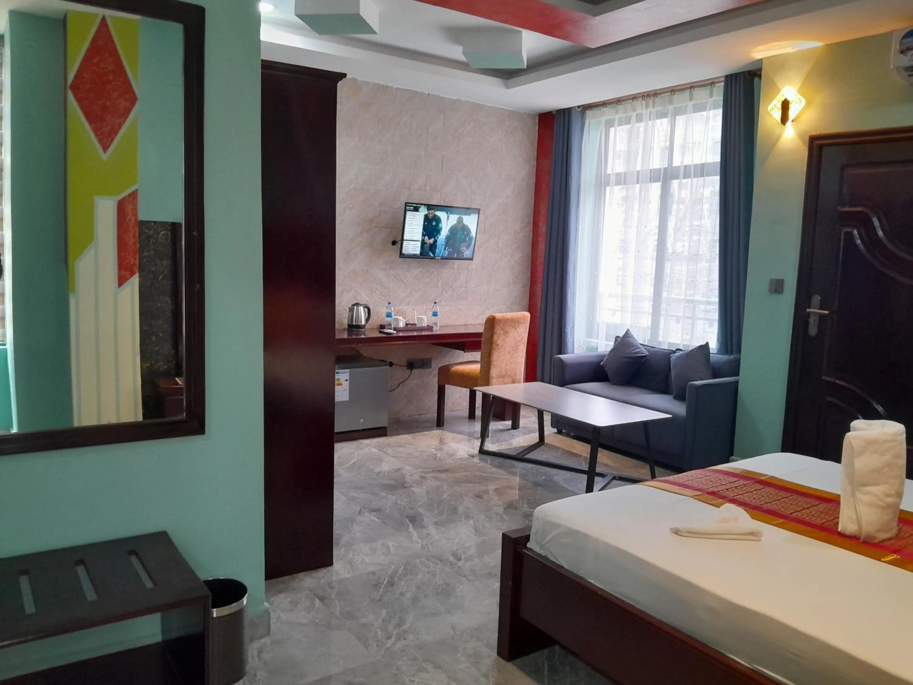 Bed in Mazola Diamond Hotel
