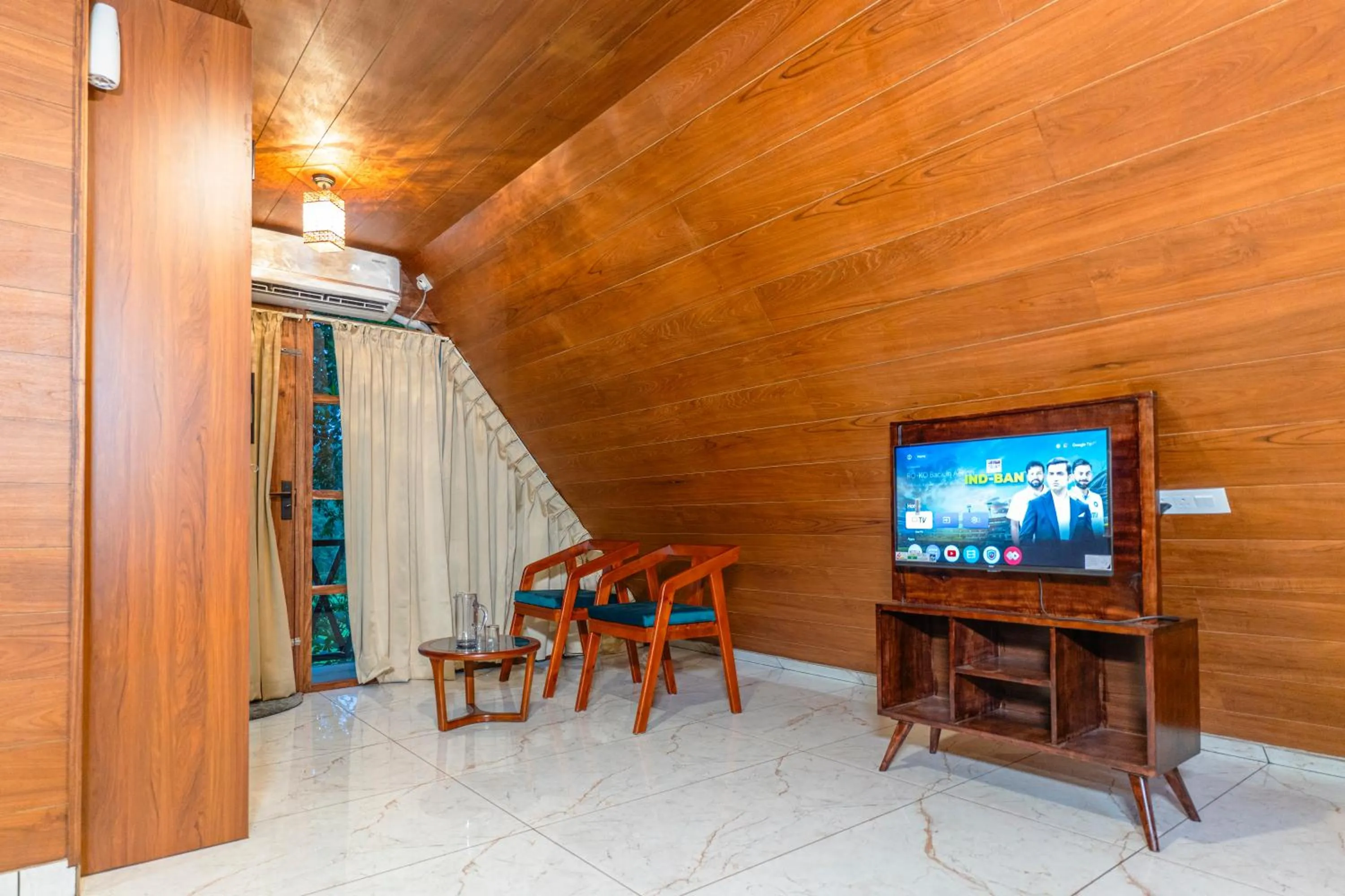 TV and multimedia in Ethnic Villa Wayanad