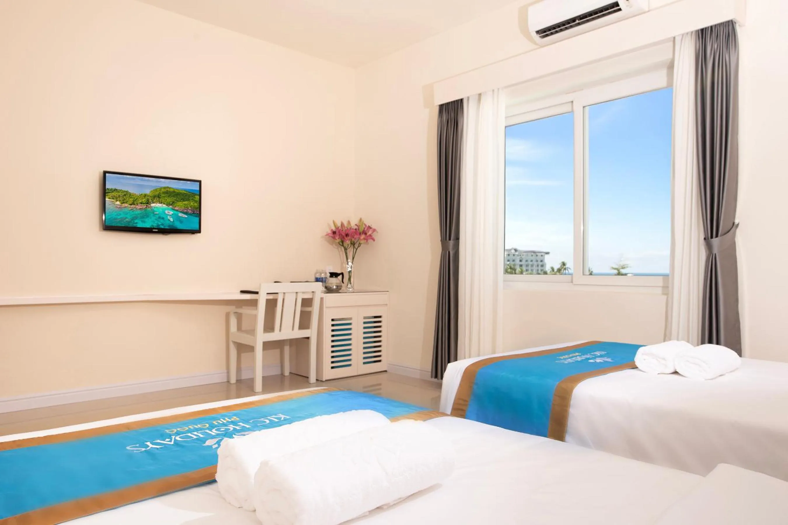 Bed in KLC Holidays Phu Quoc Hotel