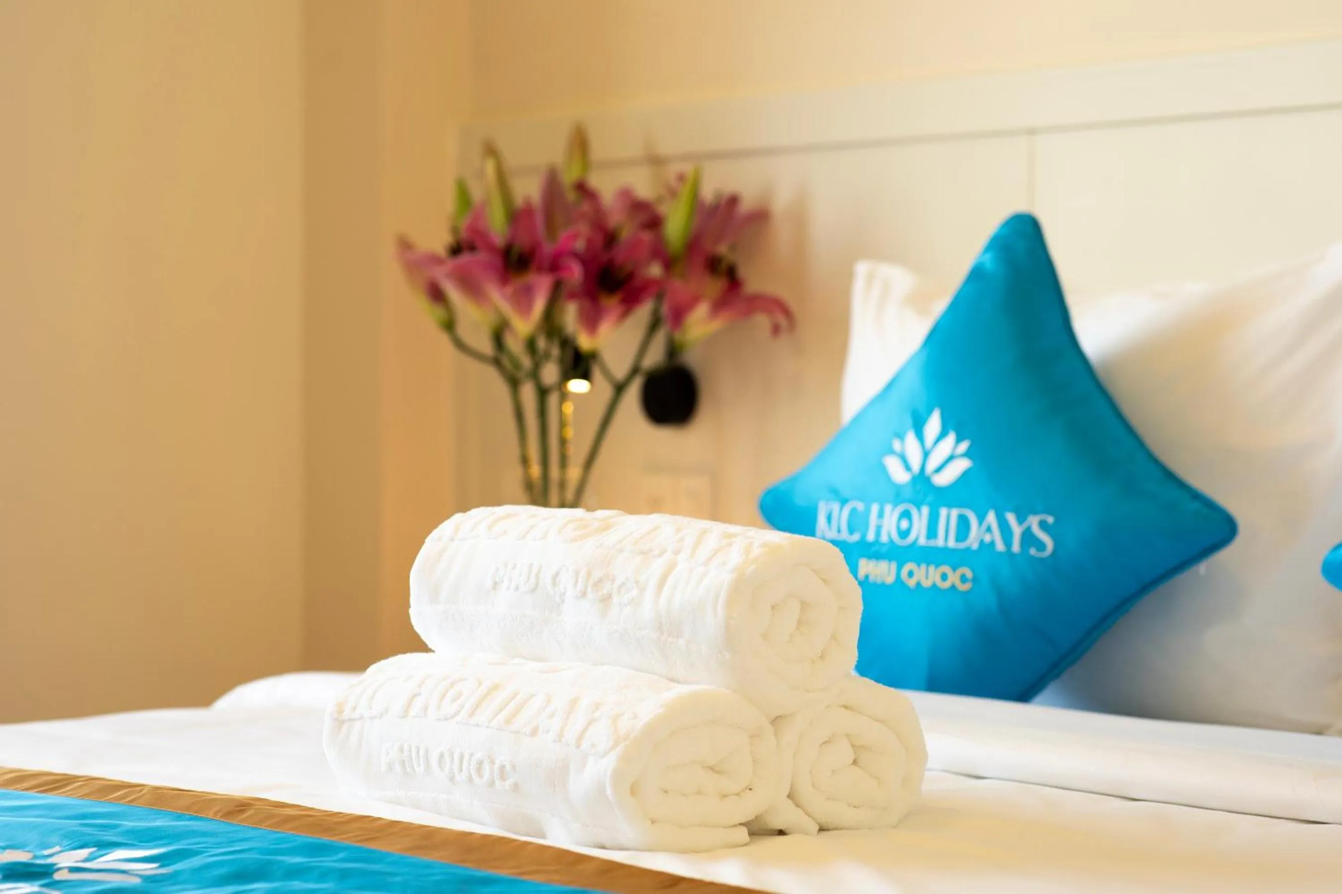 Bed in KLC Holidays Phu Quoc Hotel