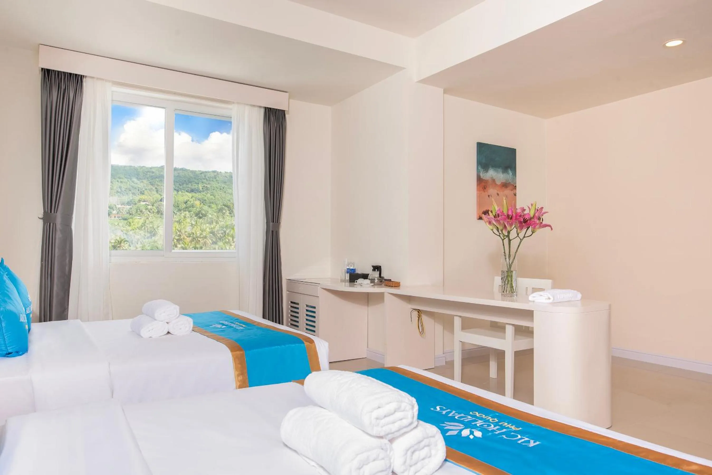 Bed in KLC Holidays Phu Quoc Hotel