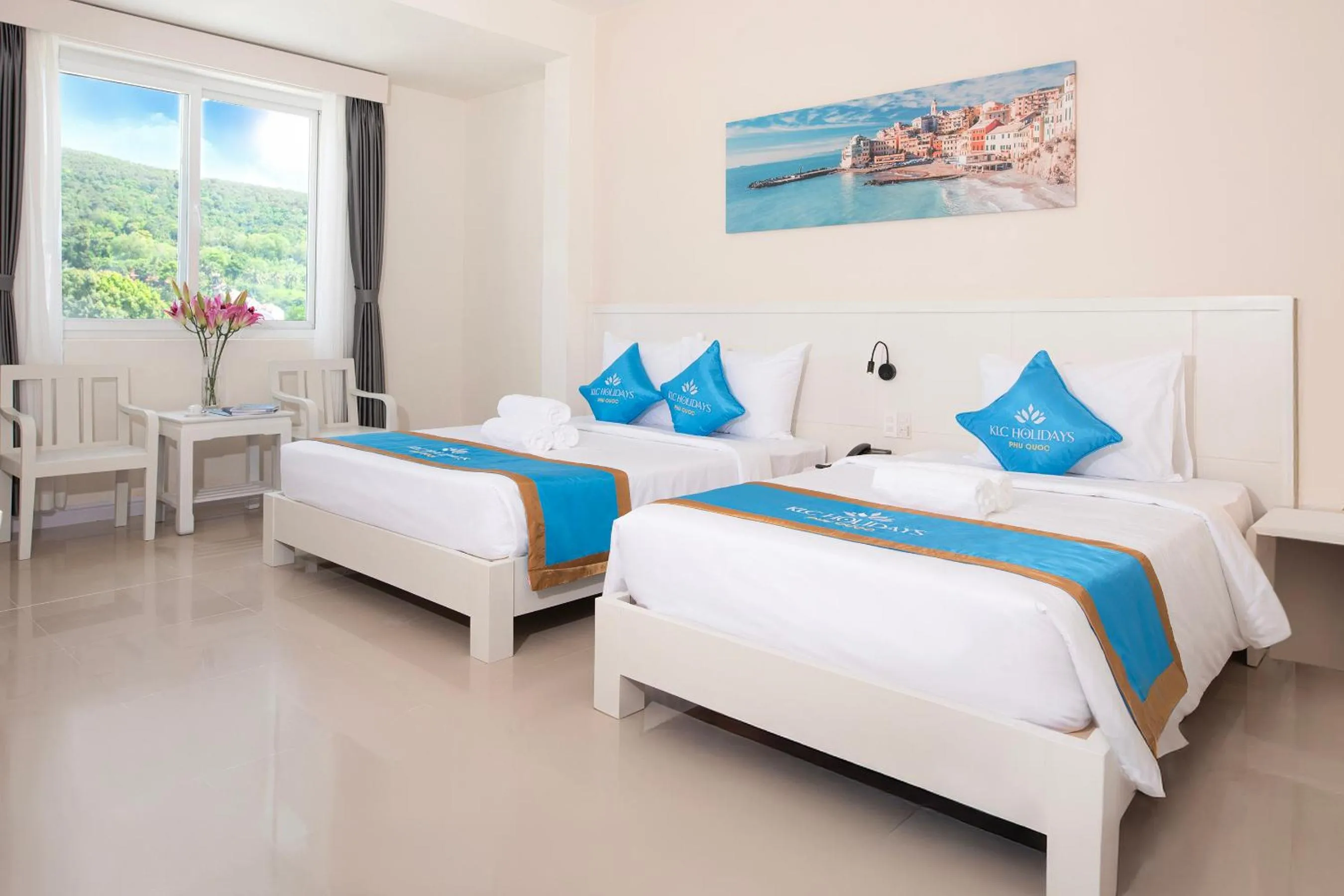 Bed in KLC Holidays Phu Quoc Hotel