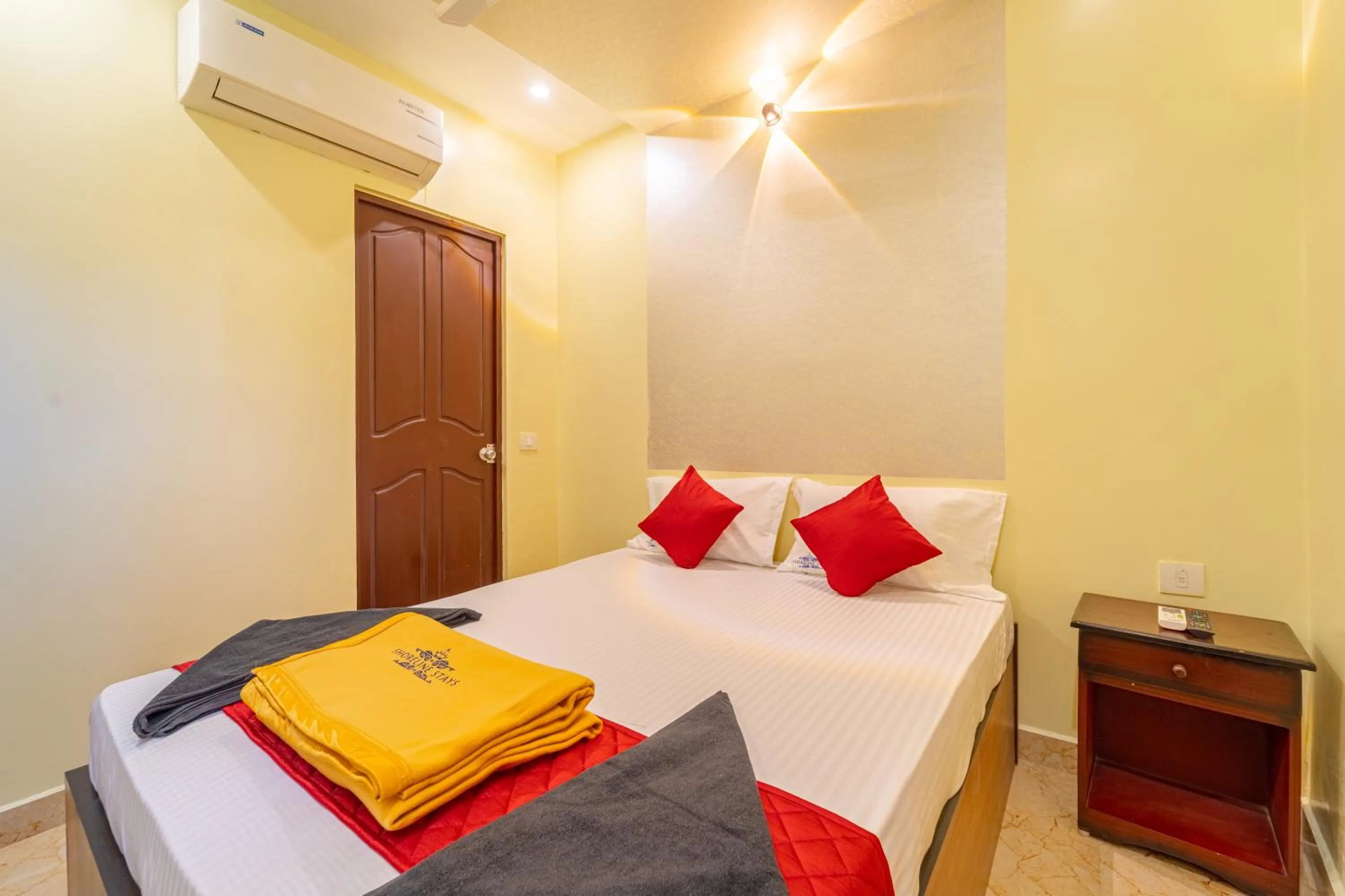 towels in Shoreline Stays Near Rock Beach