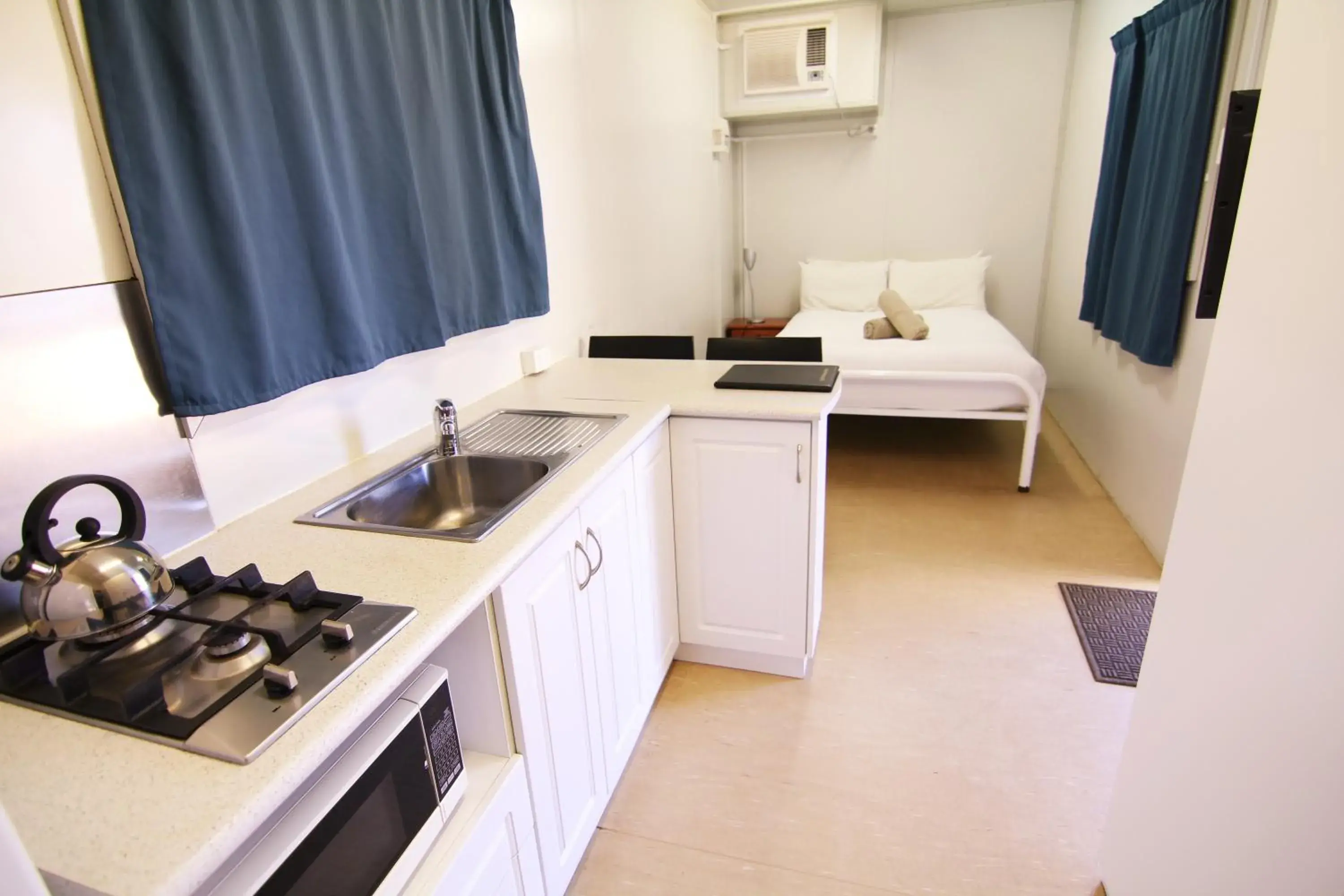 Budget Cabin Double with Shared Bathroom in Coral Coast Tourist Park Budget Cabin Double with Shared Bathroom in Coral Coast Tourist Park