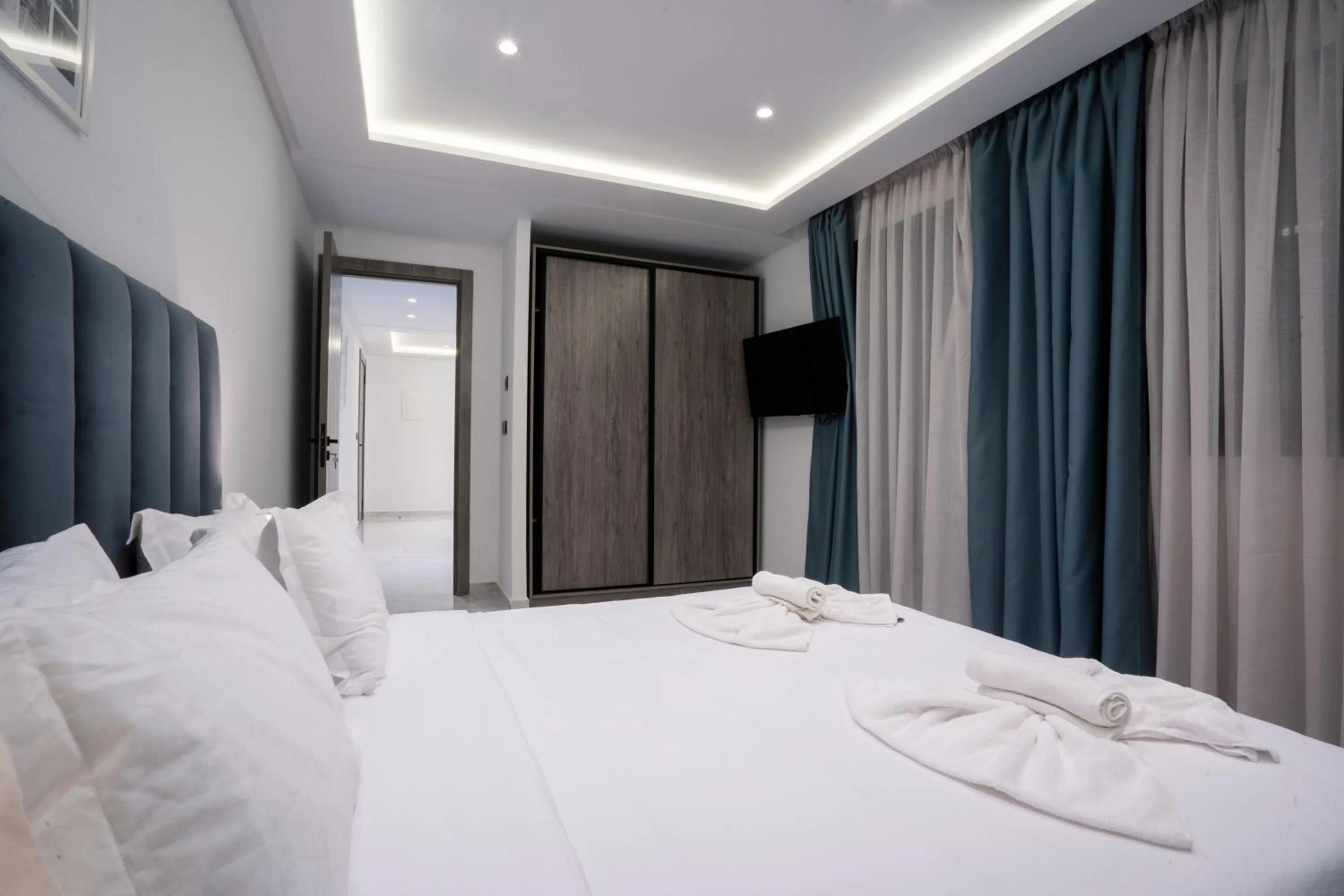 Bed in Amelia Appart-Hotel