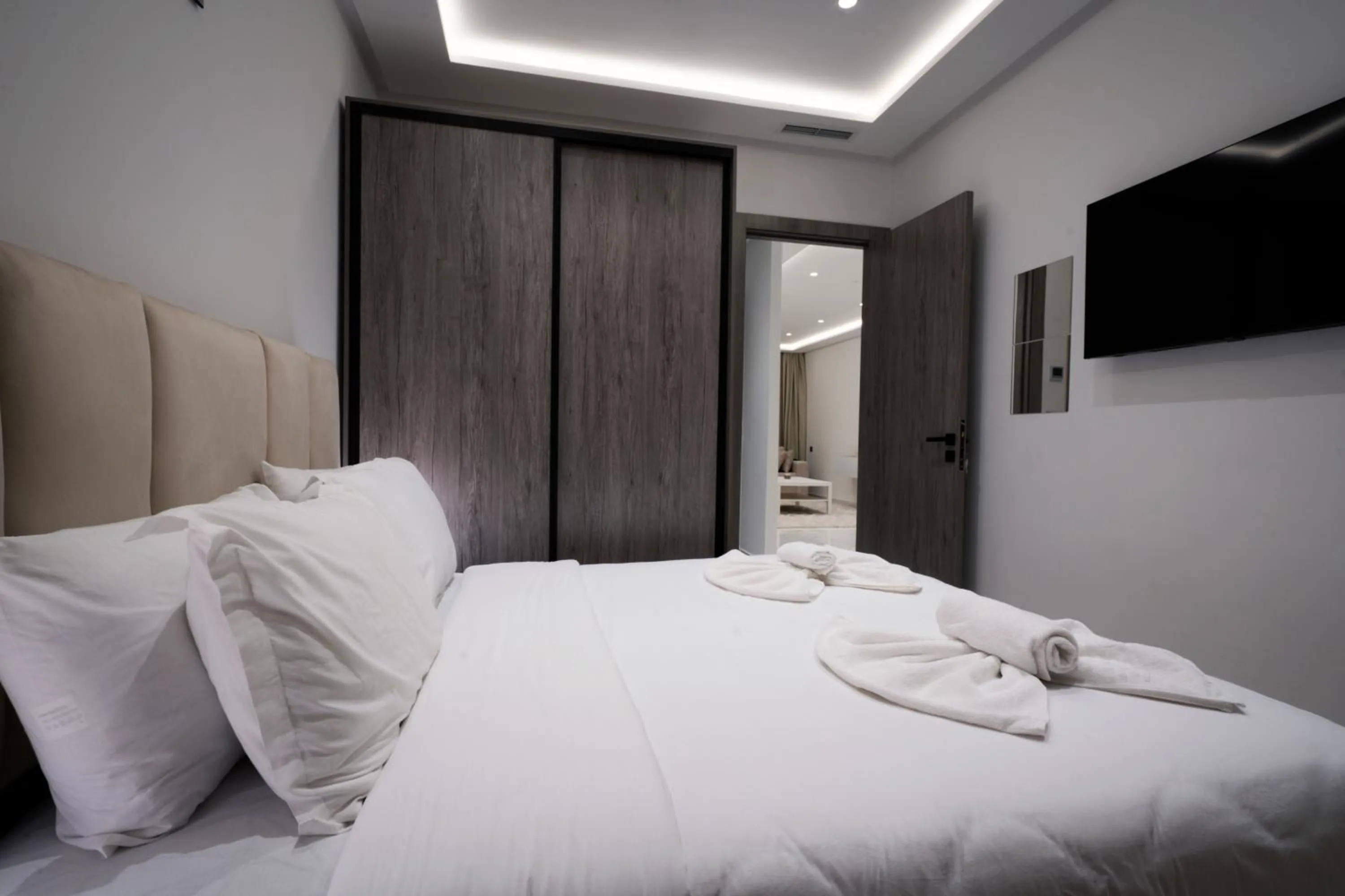 Bed in Amelia Appart-Hotel