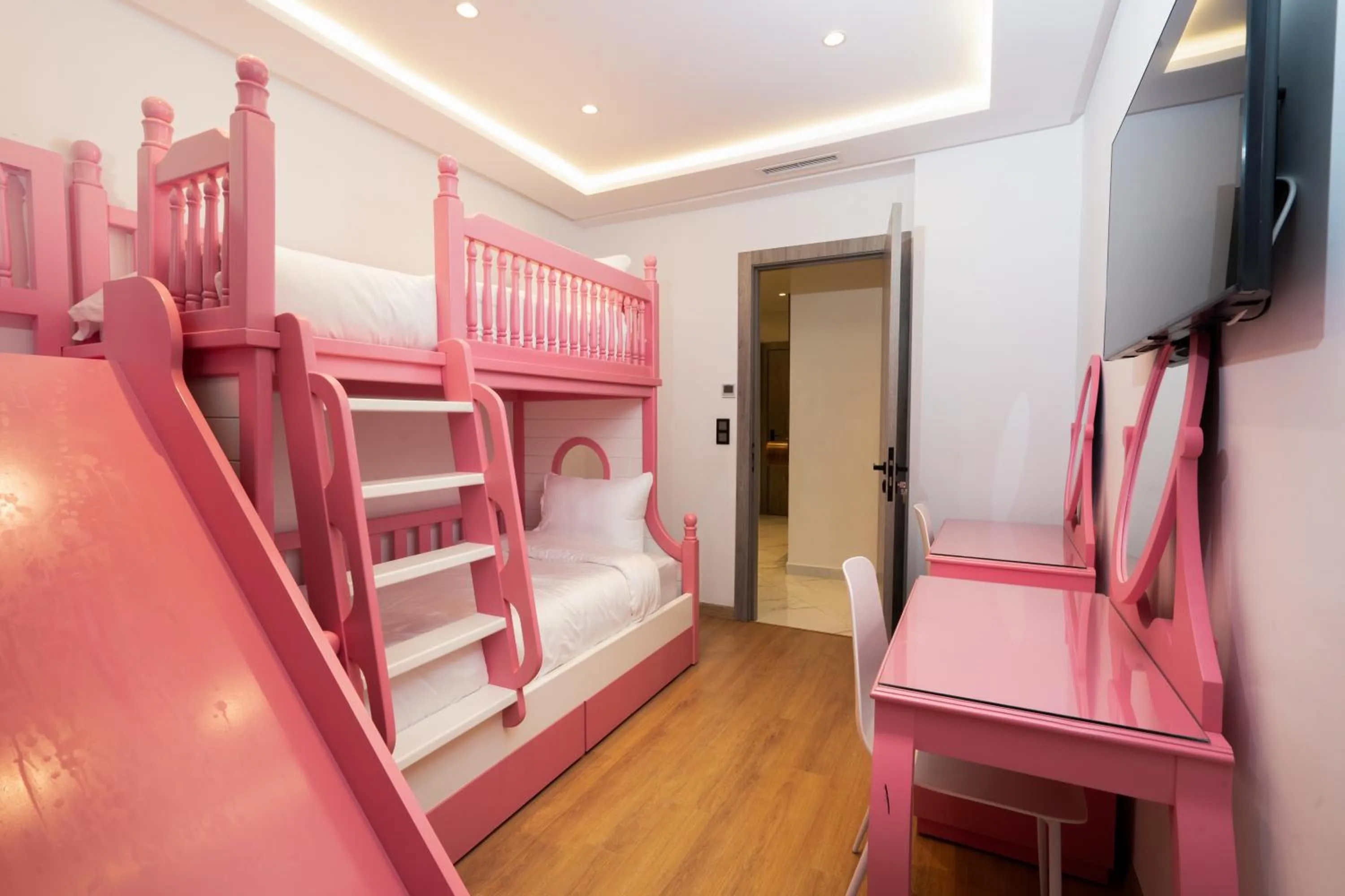 Bed in Amelia Appart-Hotel