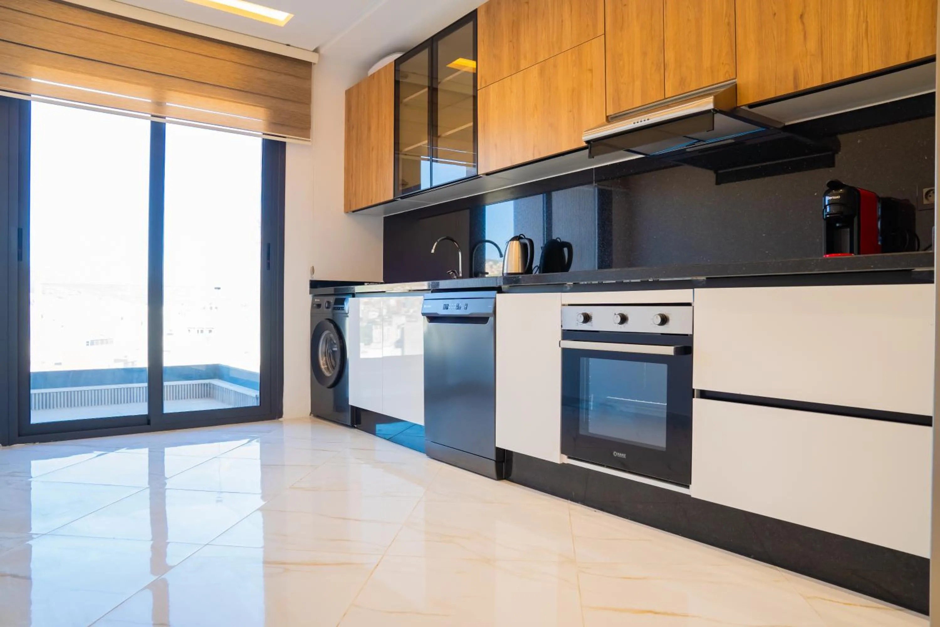 Kitchen or kitchenette in Amelia Appart-Hotel