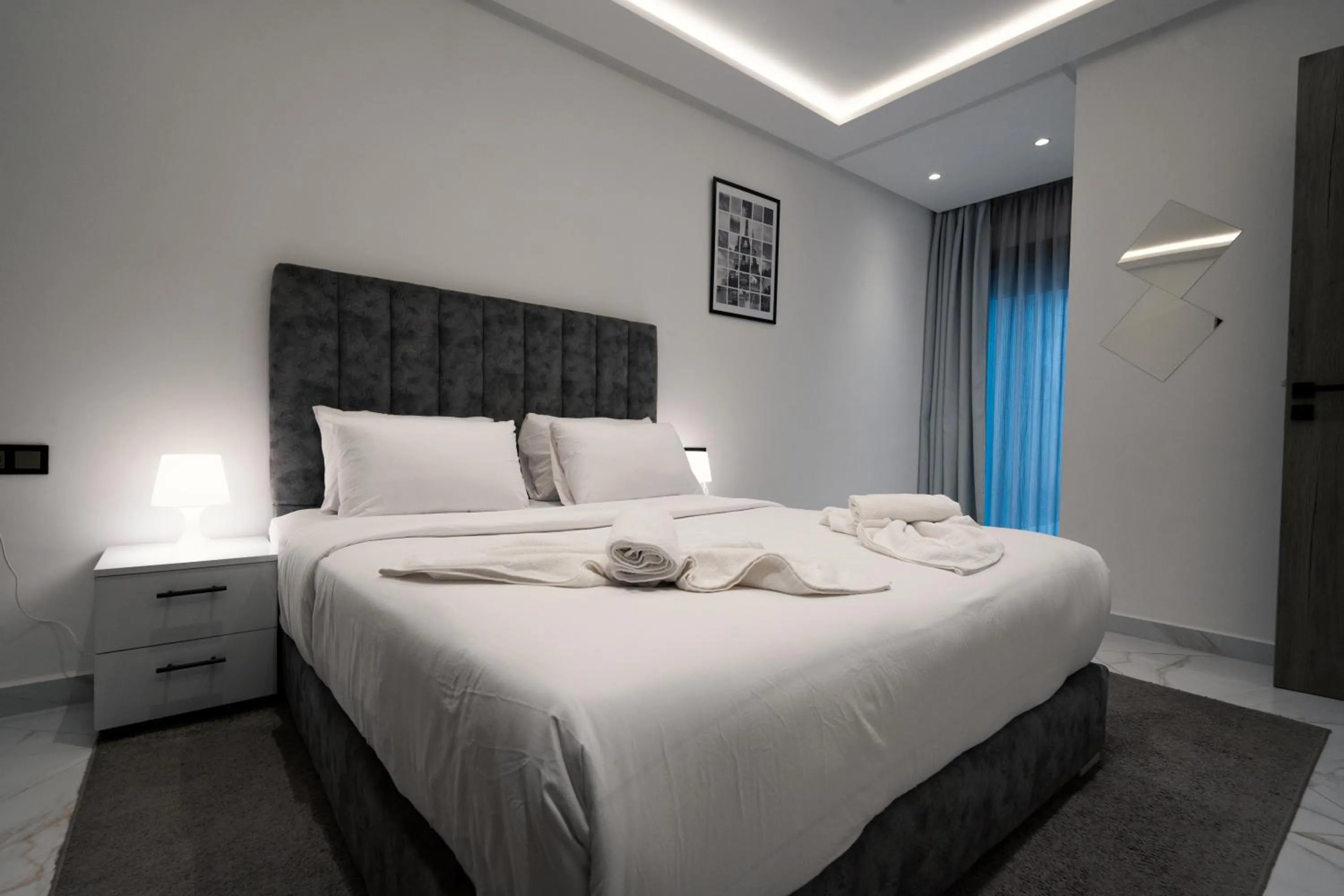 Bed in Amelia Appart-Hotel